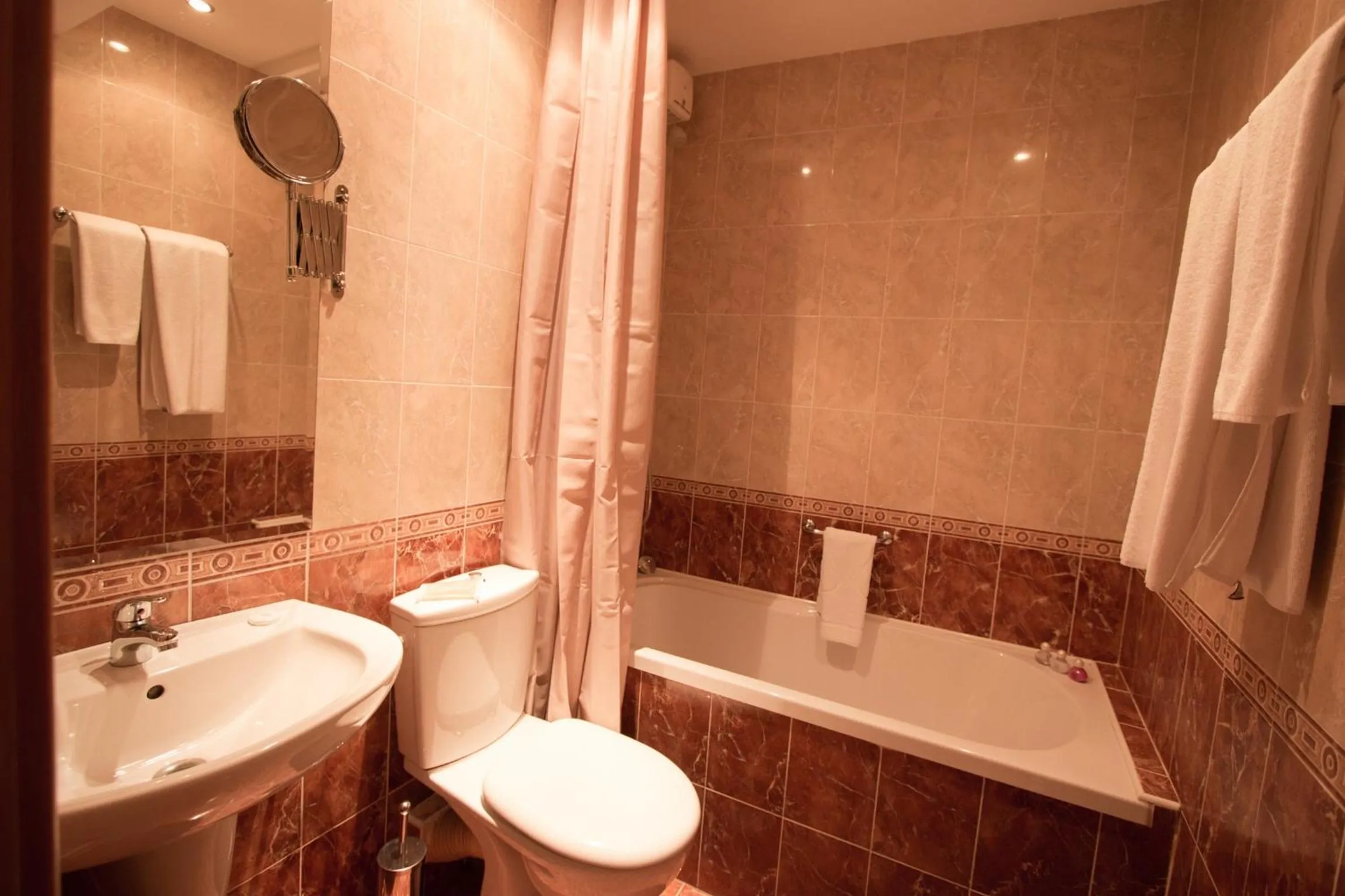 Toilet in Hotel Divesta - self check in