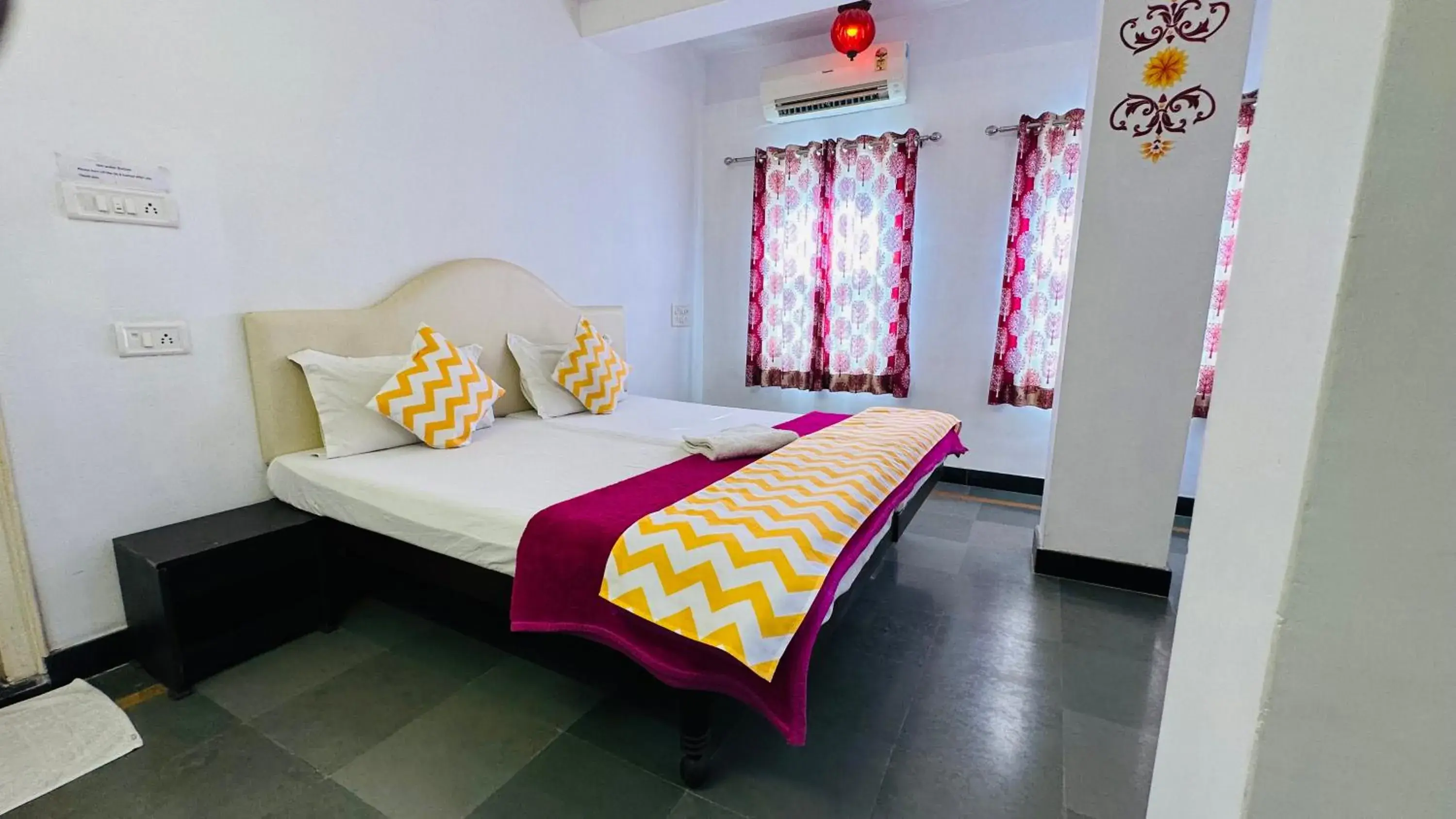 Bed in Maa Ji House on Lake Pichola Bed in Maa Ji House on Lake Pichola