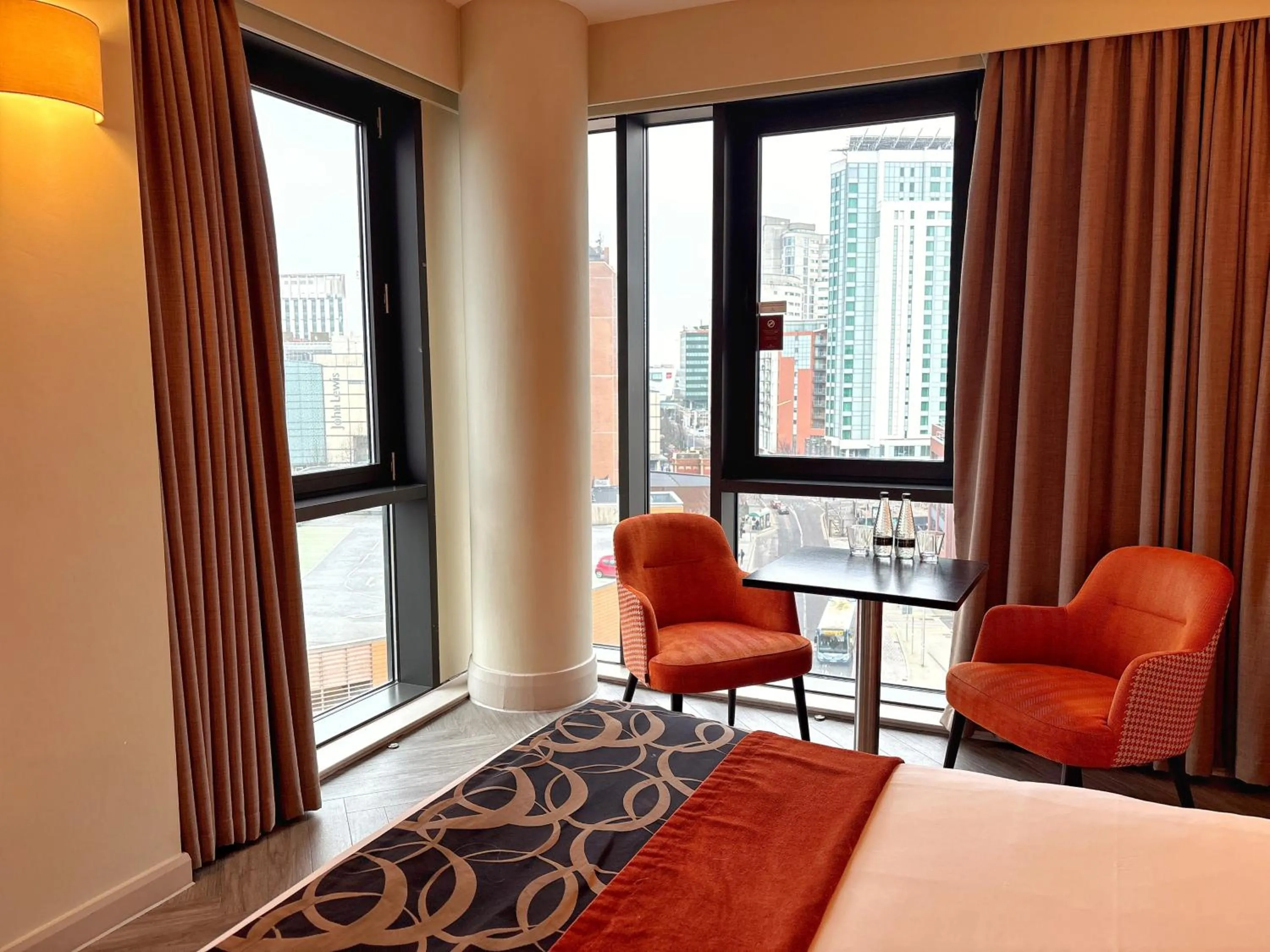 Seating area, Bed in Clayton Hotel Cardiff