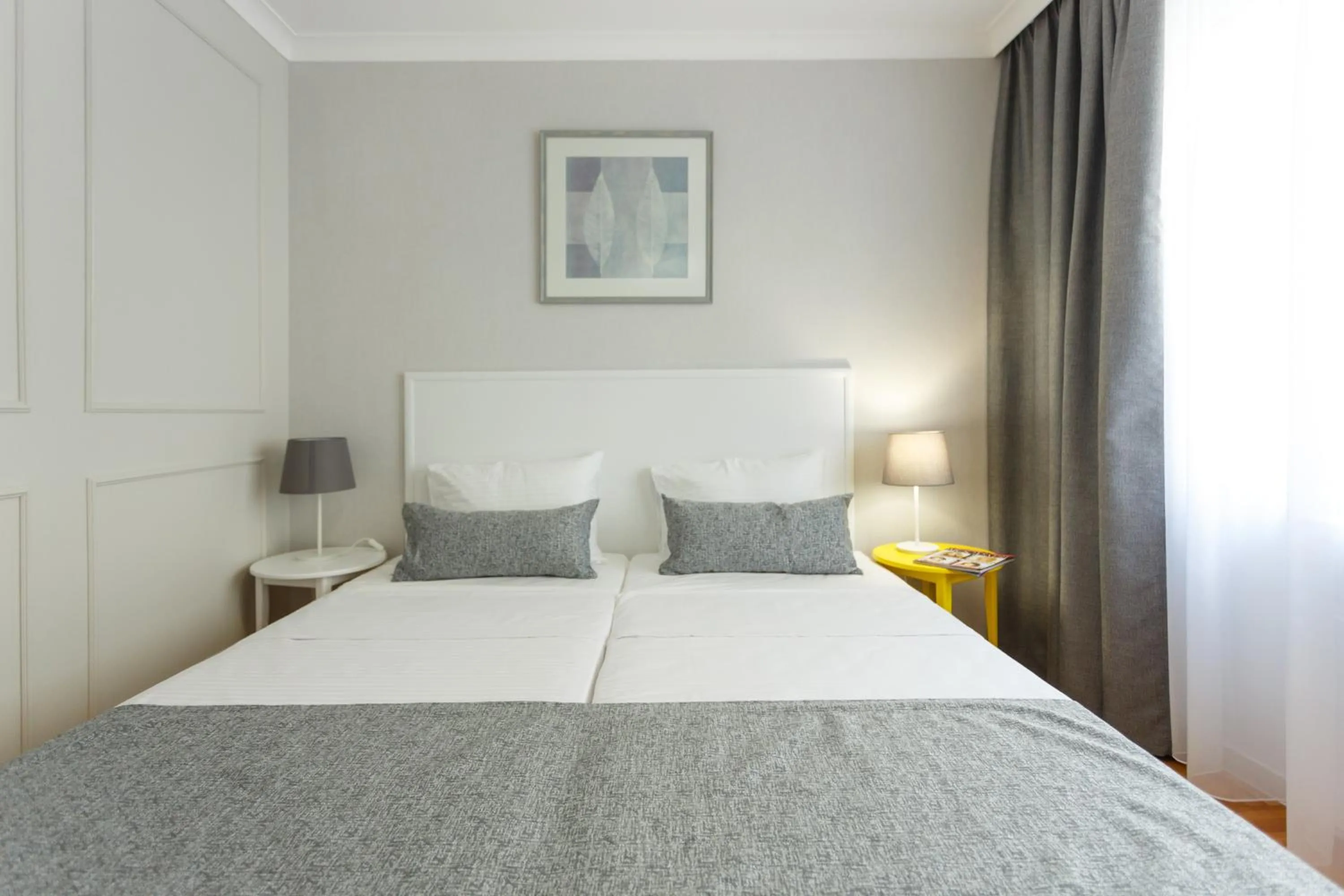 Bed in CityResidence Aparthotel