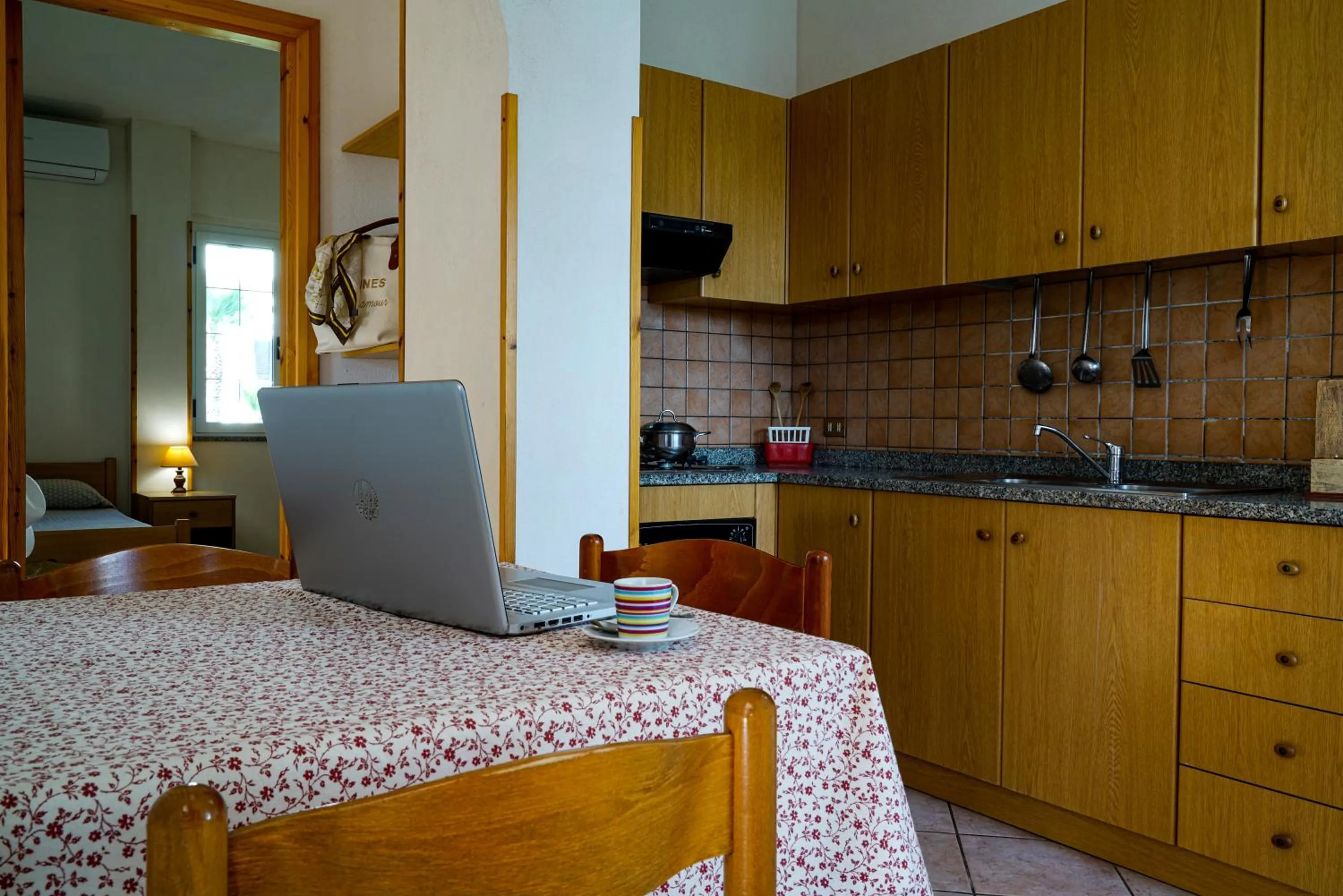 Kitchen or kitchenette in Rosy Hotel Residence