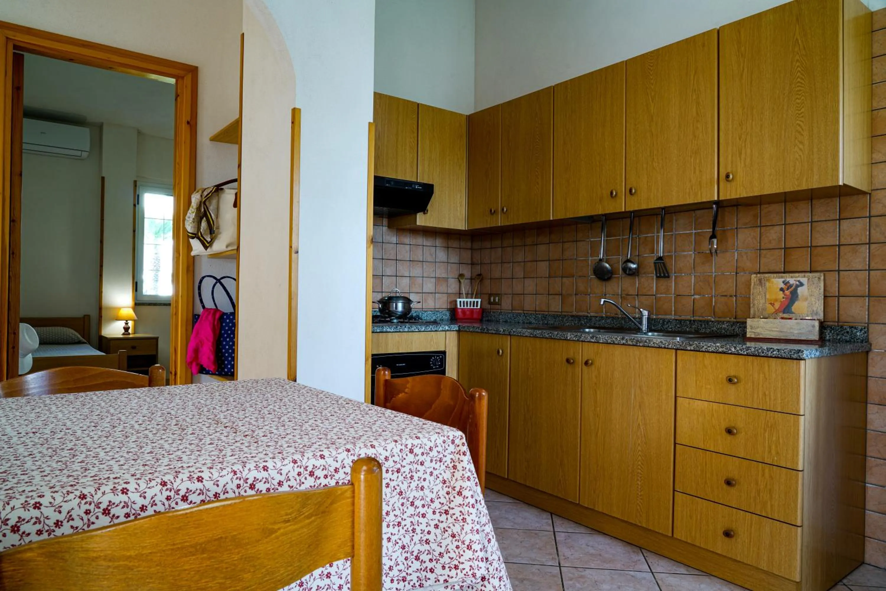 Kitchen or kitchenette in Rosy Hotel Residence