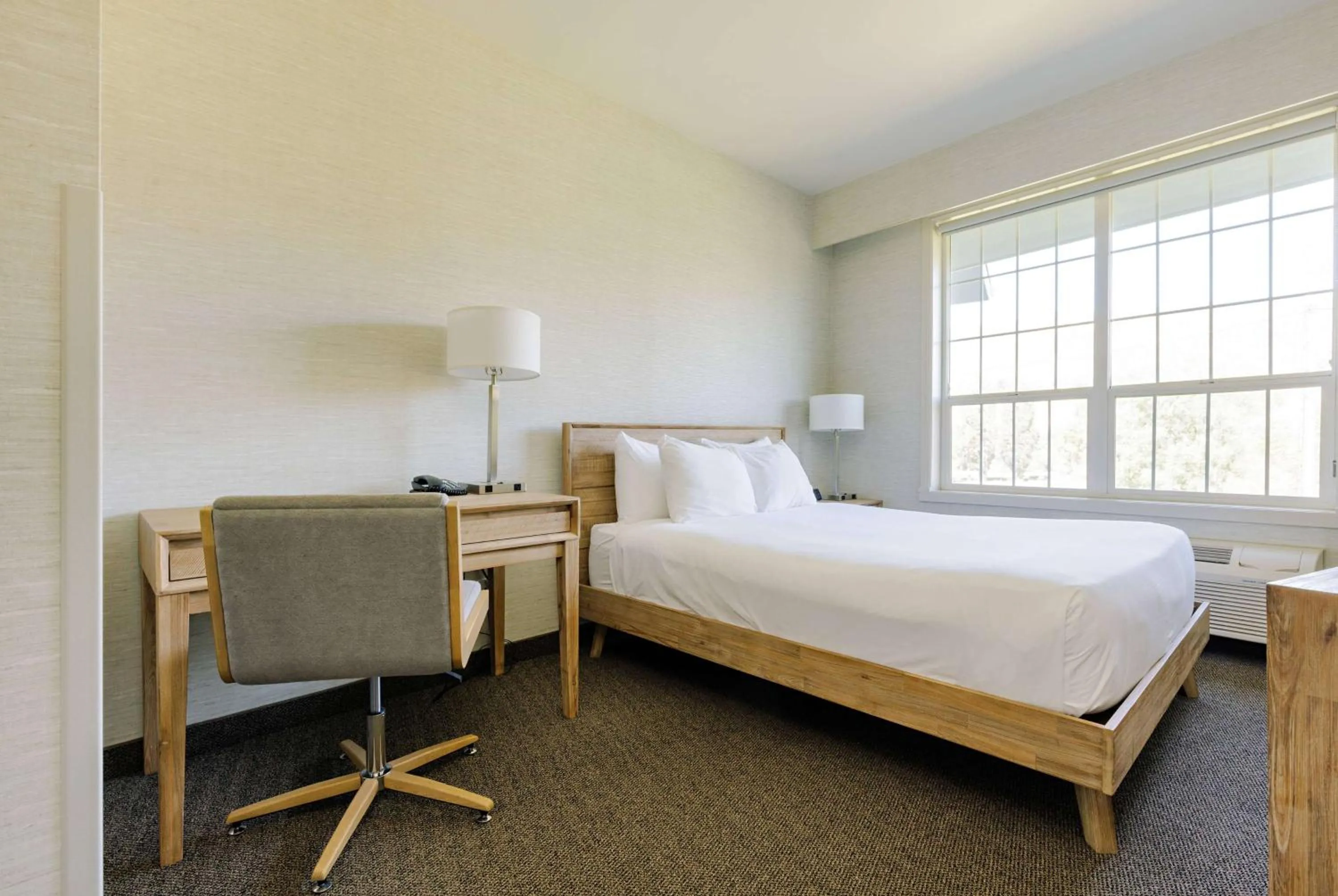 Photo of the whole room, Bed in Balcomo, a Ramada by Wyndham