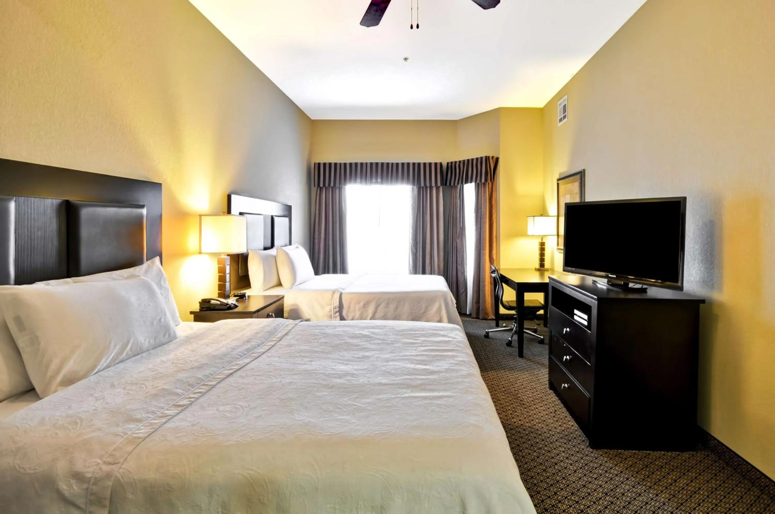 Bed in Homewood Suites by Hilton Tulsa-South