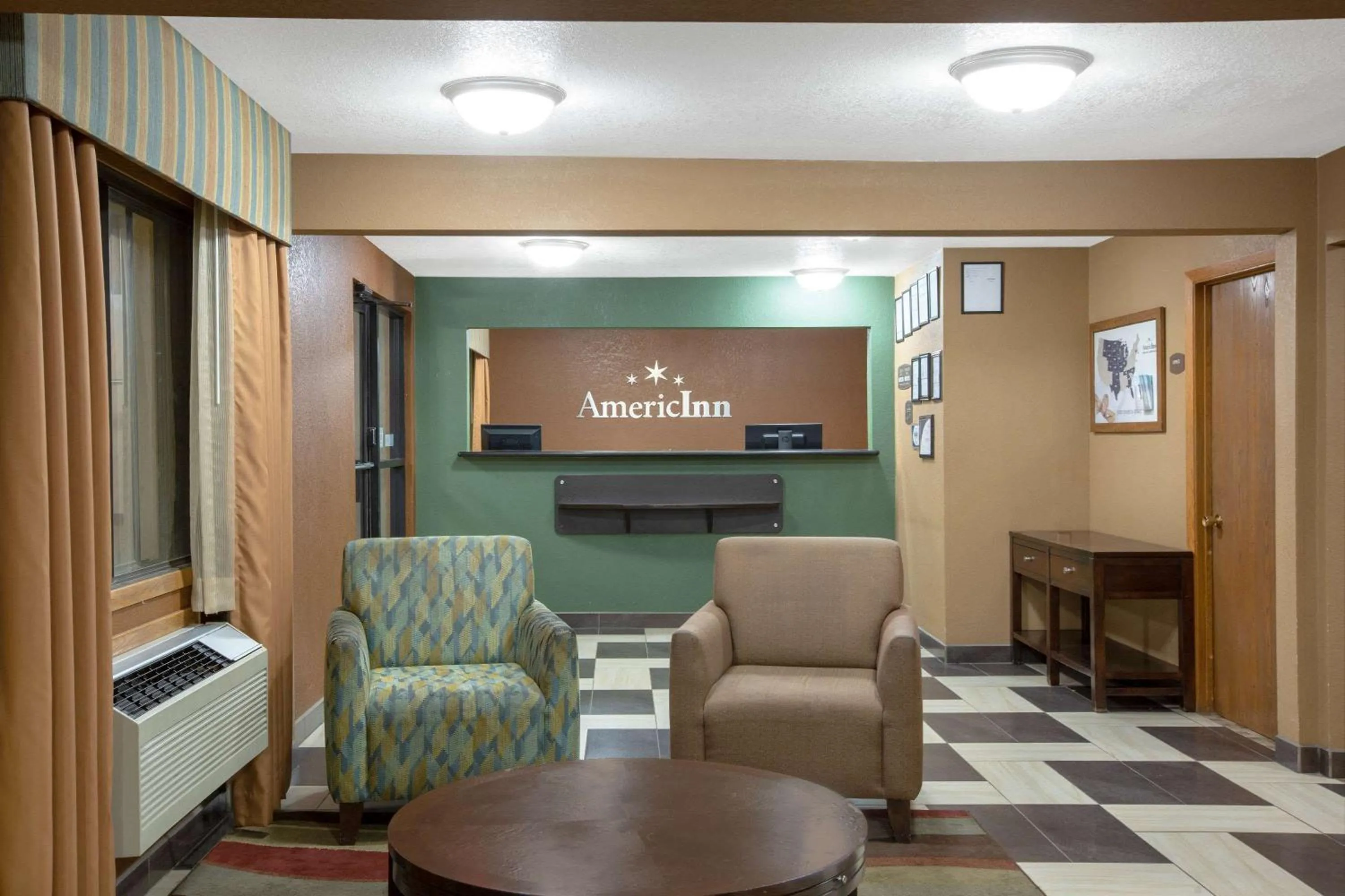 Lobby or reception in AmericInn by Wyndham Council Bluffs