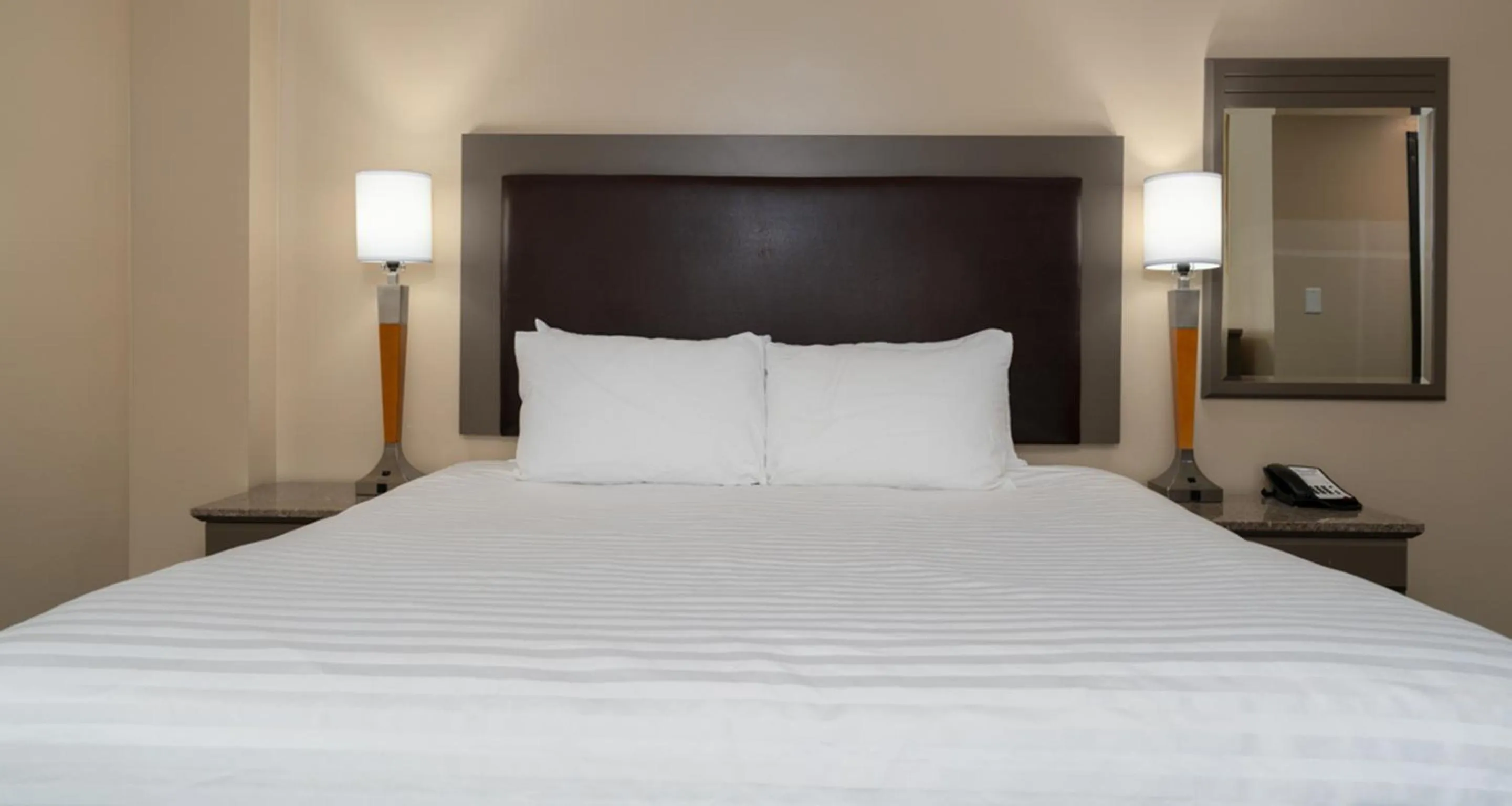 Bed in Prestige Oceanview Hotel Prince Rupert