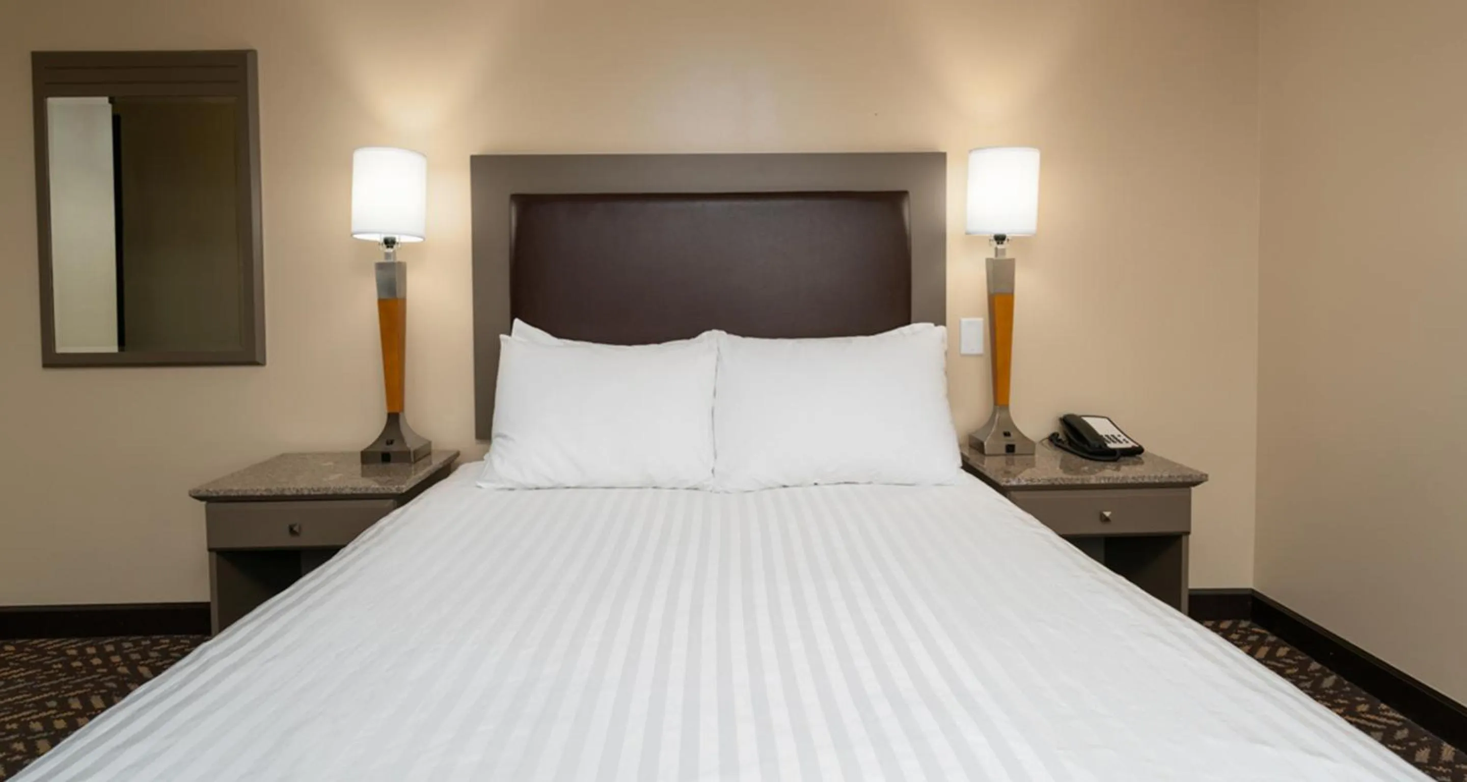 Bed in Prestige Oceanview Hotel Prince Rupert