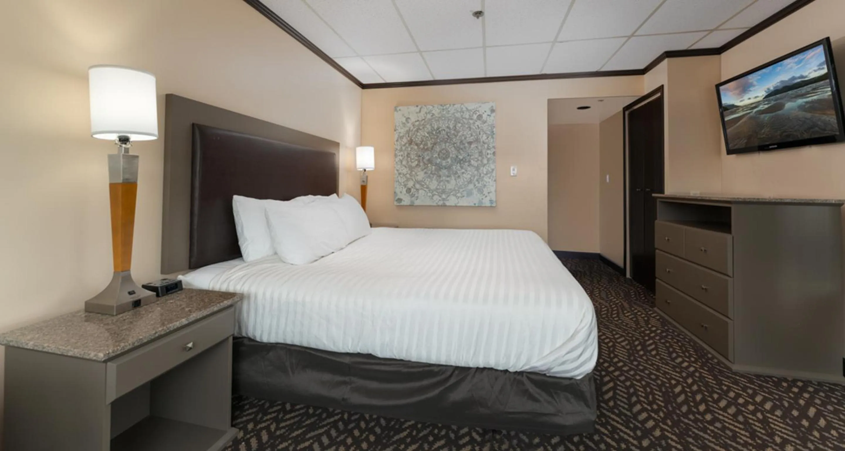 Bed in Prestige Oceanview Hotel Prince Rupert