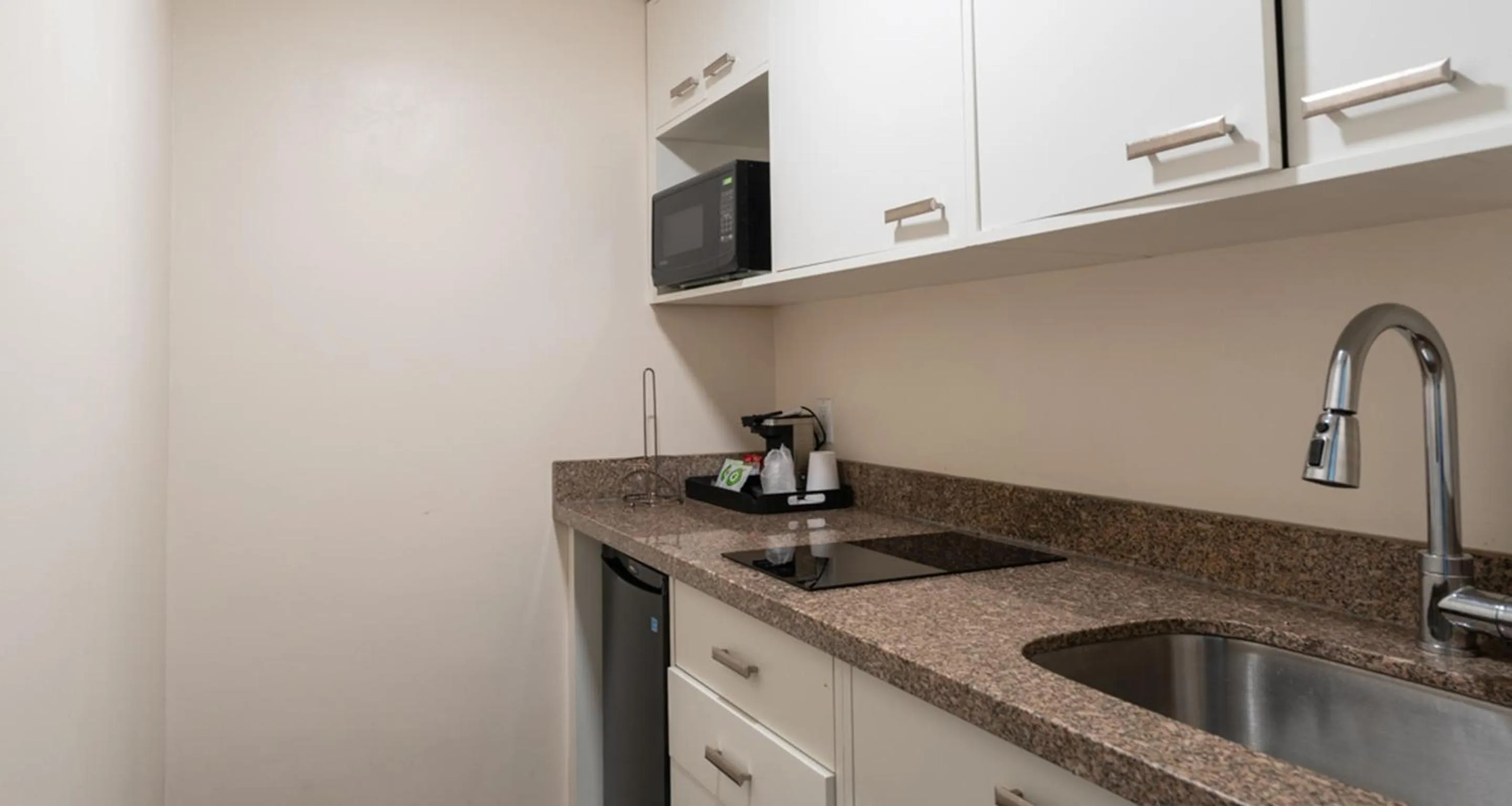 Kitchen or kitchenette in Prestige Oceanview Hotel Prince Rupert