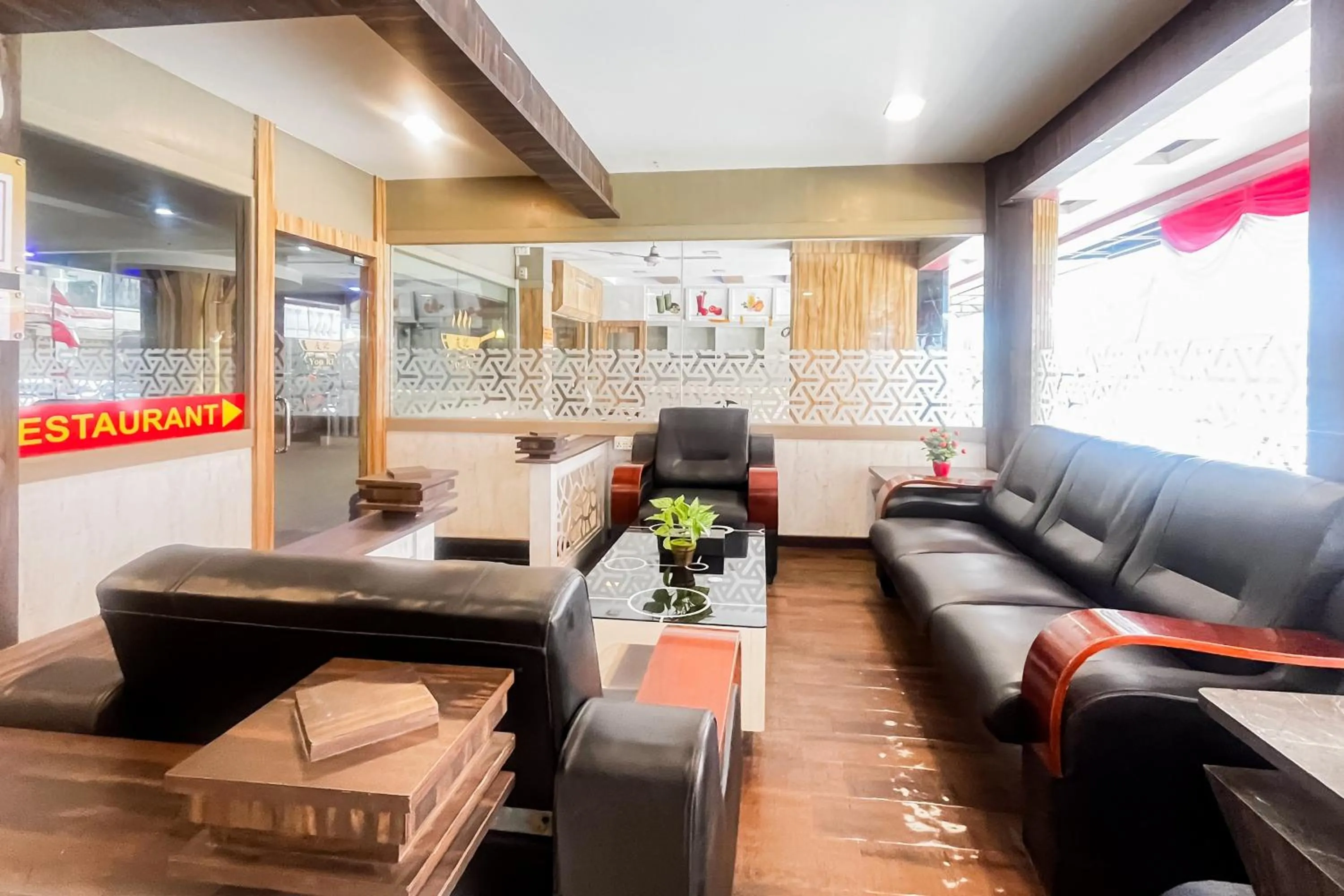 Seating area in RedDoorz Plus at Paragon Nagoya Hotel Batam