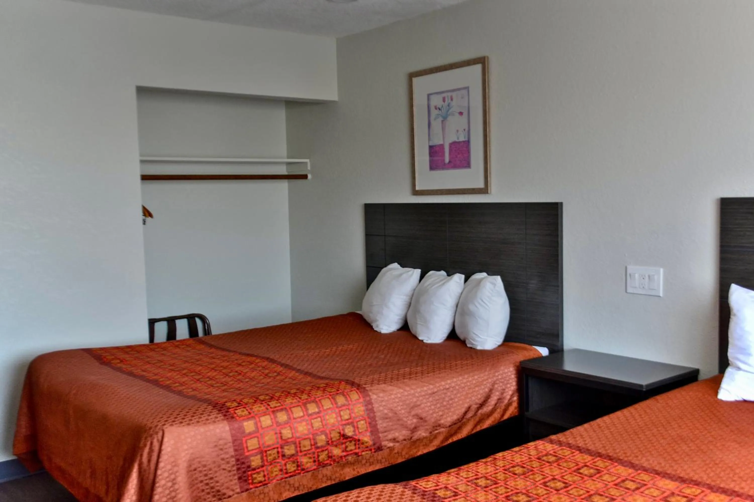 Bed in Maverick Motel - Modern Renovated Motel