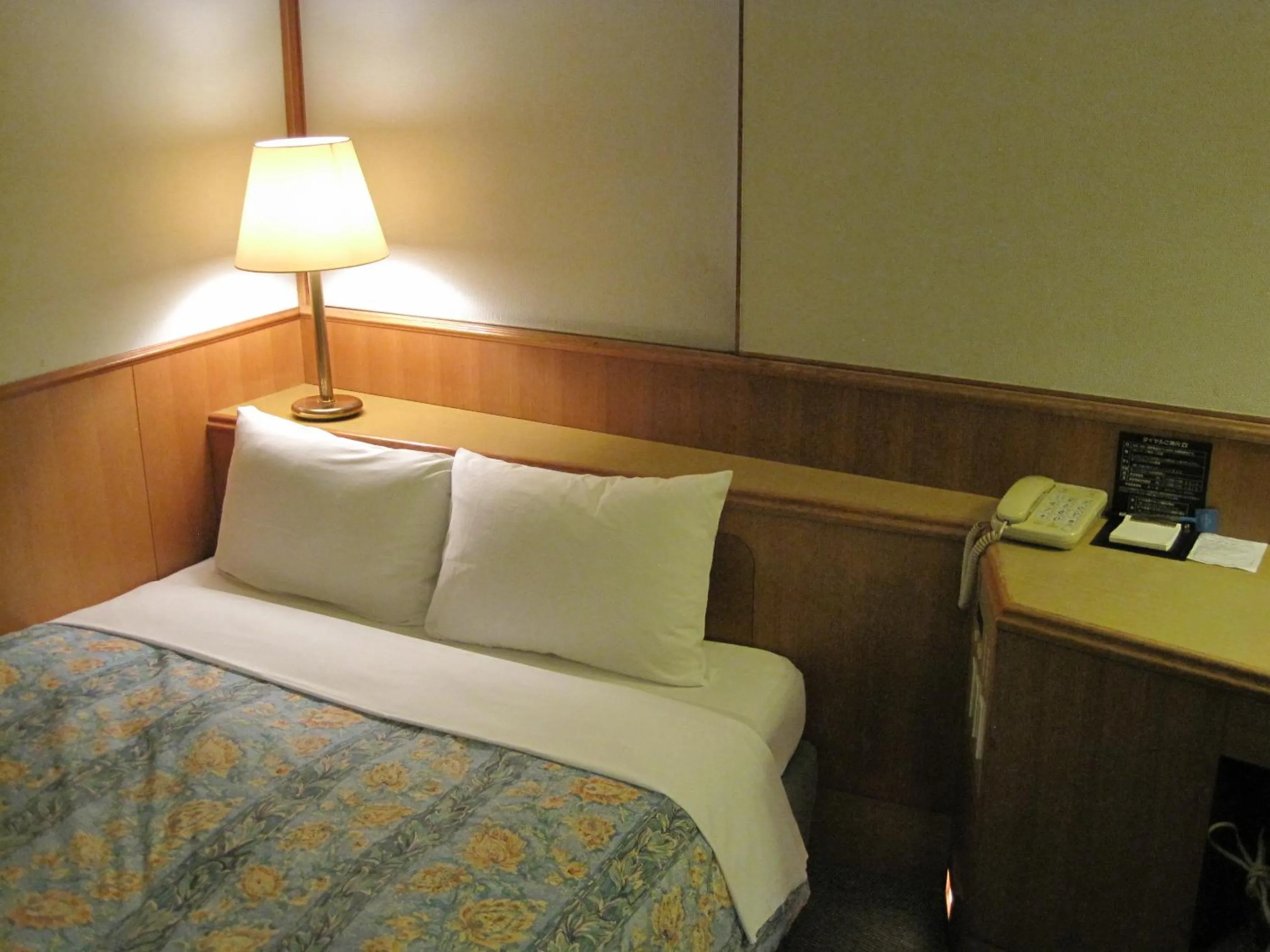 Bed in Hyuga Dai-ichi Hotel