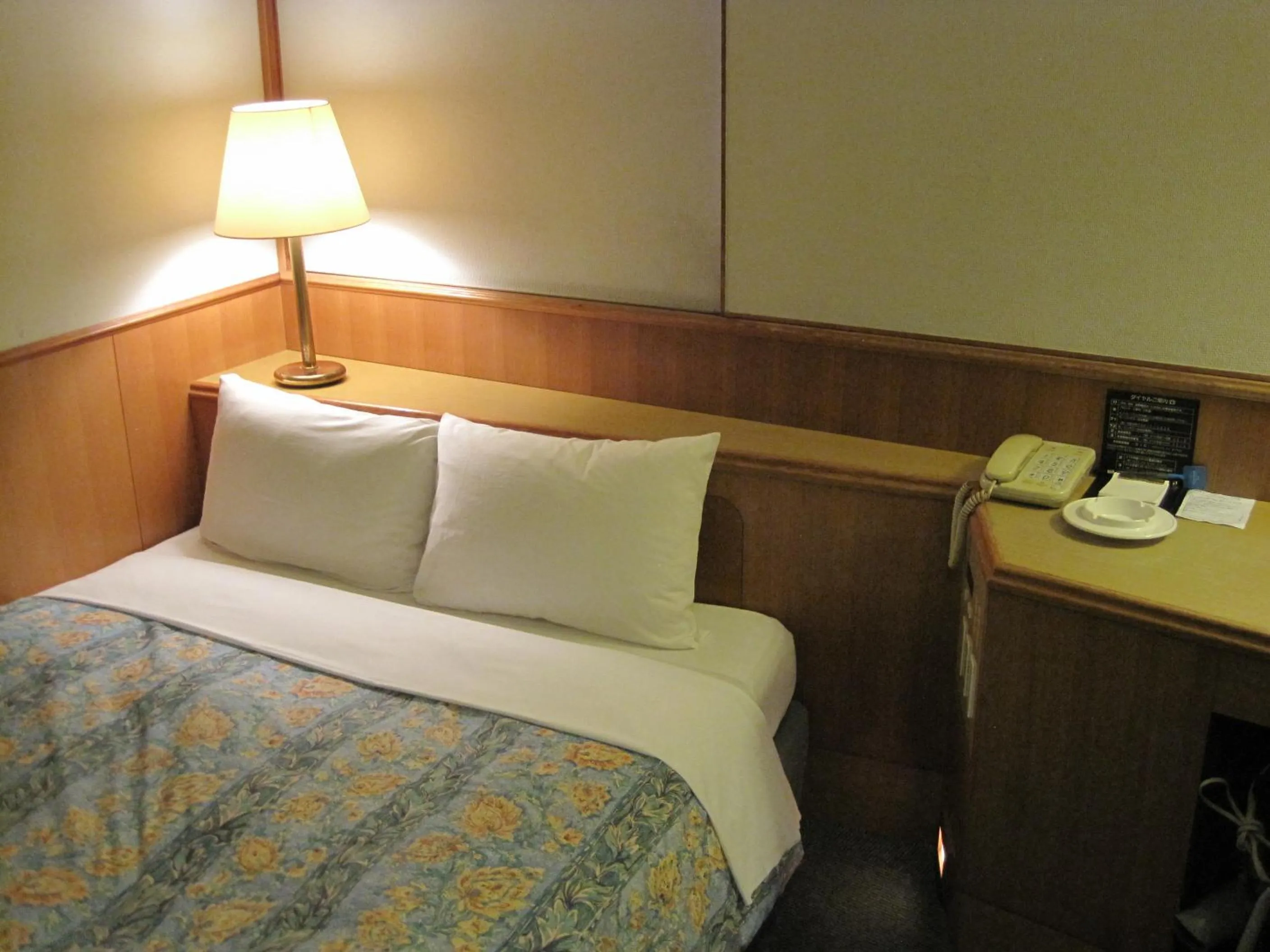 Bed in Hyuga Dai-ichi Hotel