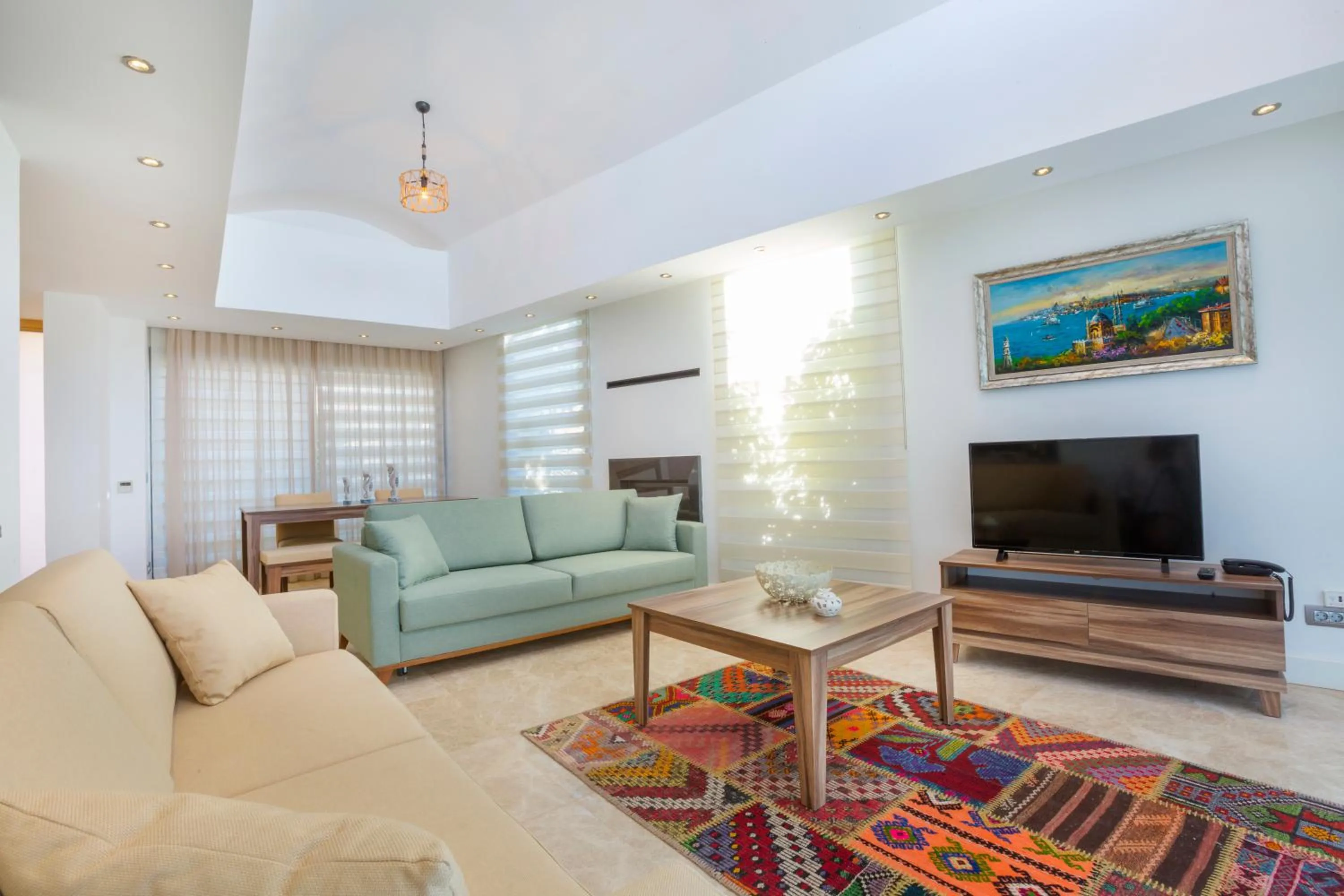 Communal lounge/ TV room in Alya Sierra Villa Hotel