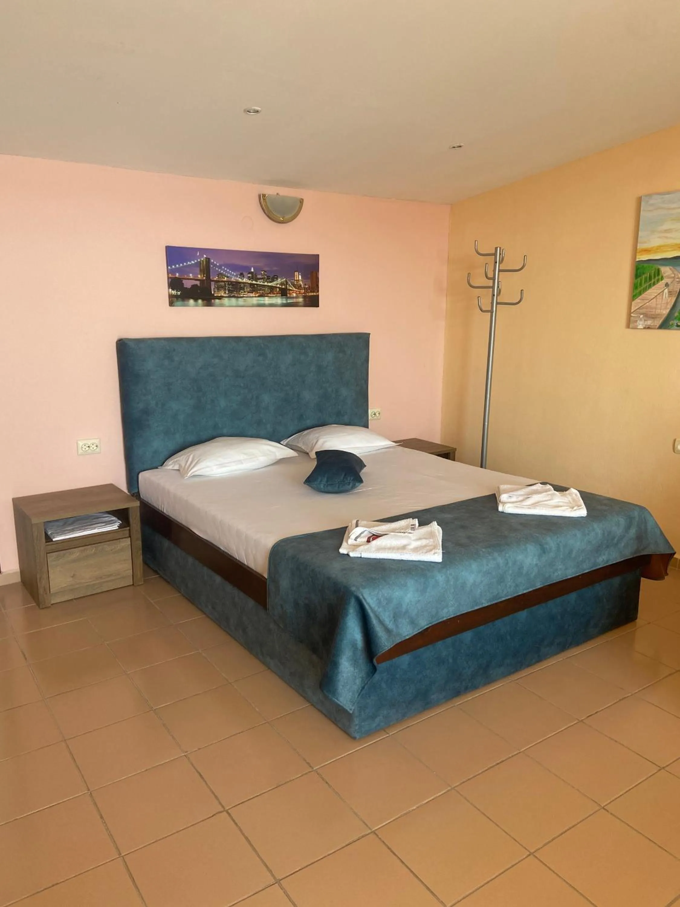 Bed in Family Hotel Verona