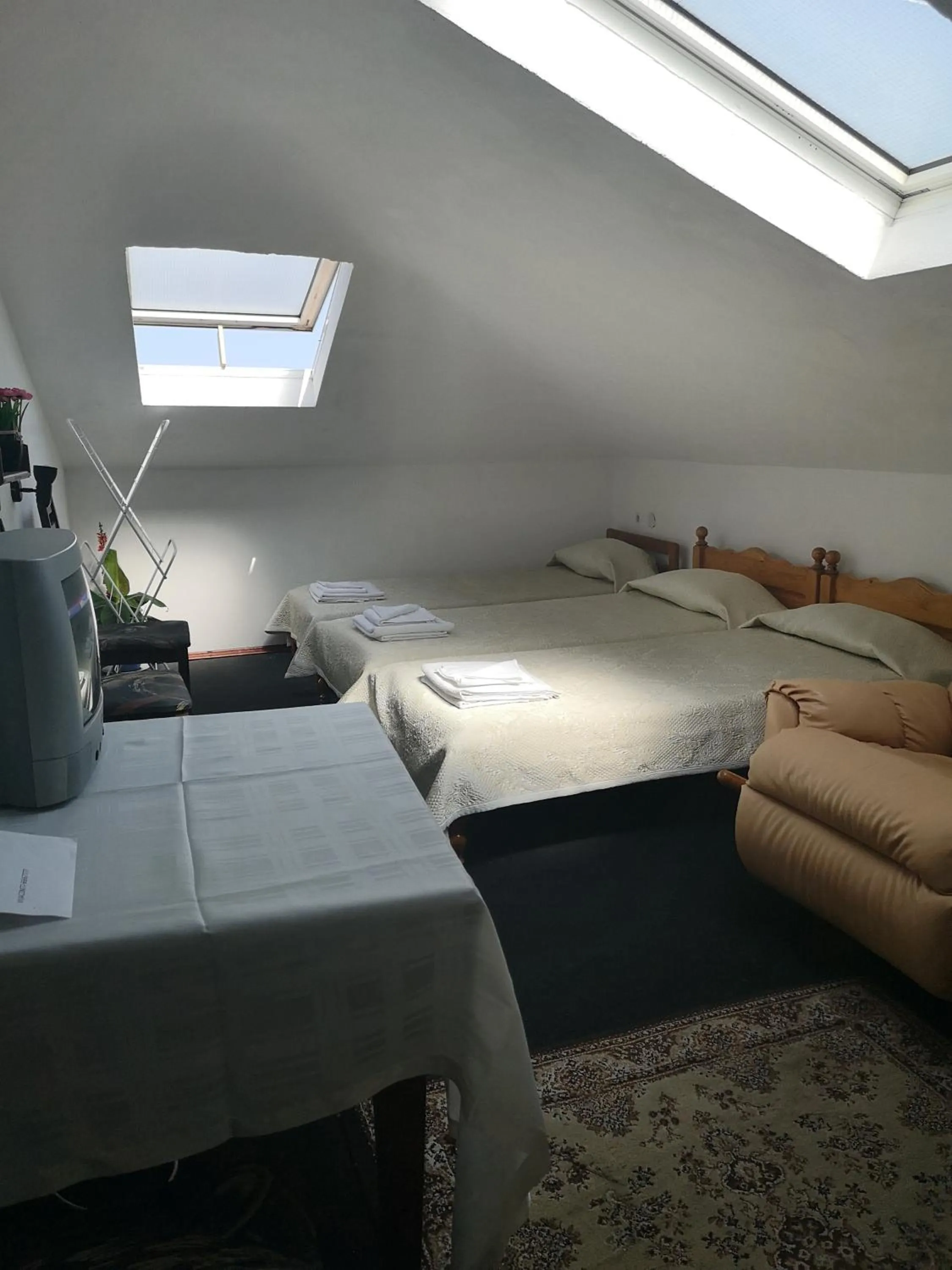 Bed in Family Hotel Verona