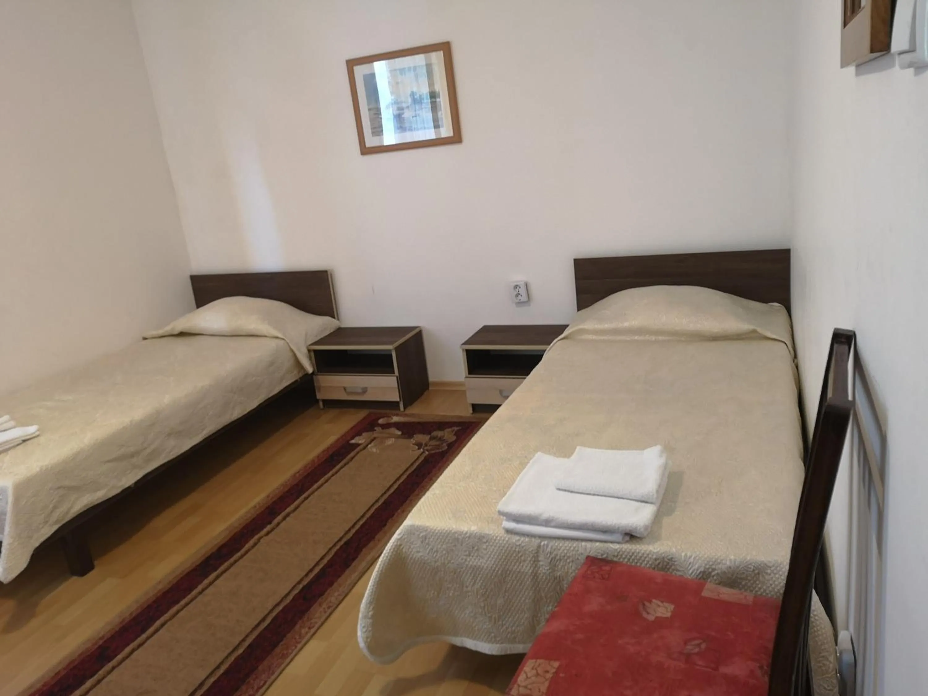 Bed in Family Hotel Verona