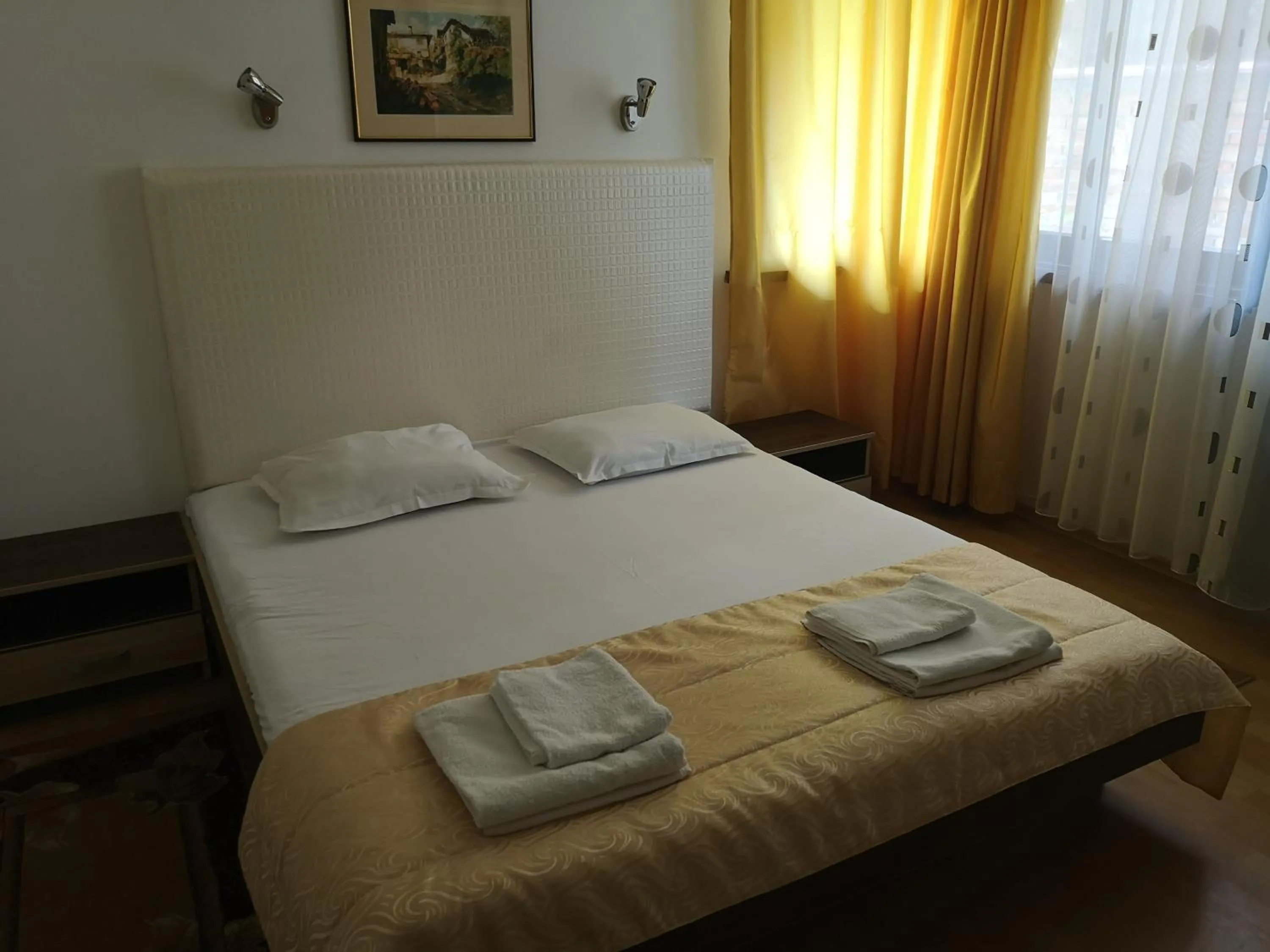 Bed in Family Hotel Verona