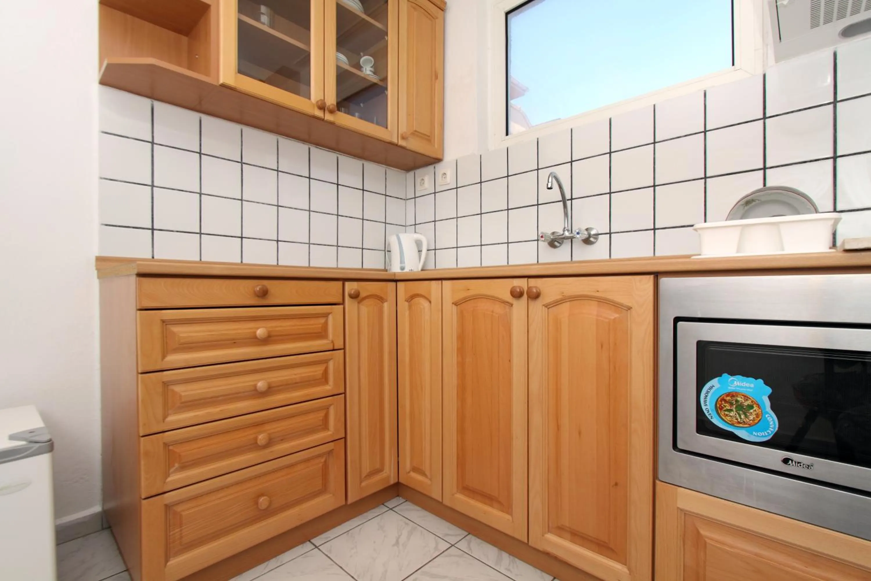 Kitchen or kitchenette in Family Hotel Verona