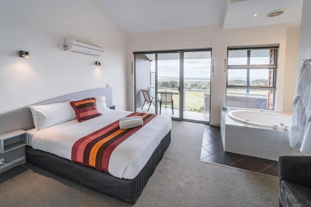 Bed in Cosy Corner Sea View Apartments