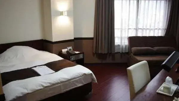 Bed in Hotel Saint Paul Nagasaki Bed in Hotel Saint Paul Nagasaki