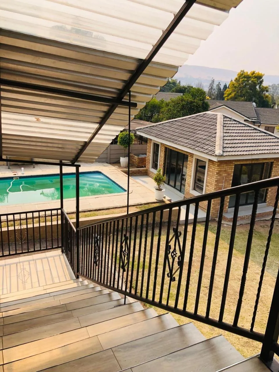 Swimming pool in La Bronze Guest Lodge