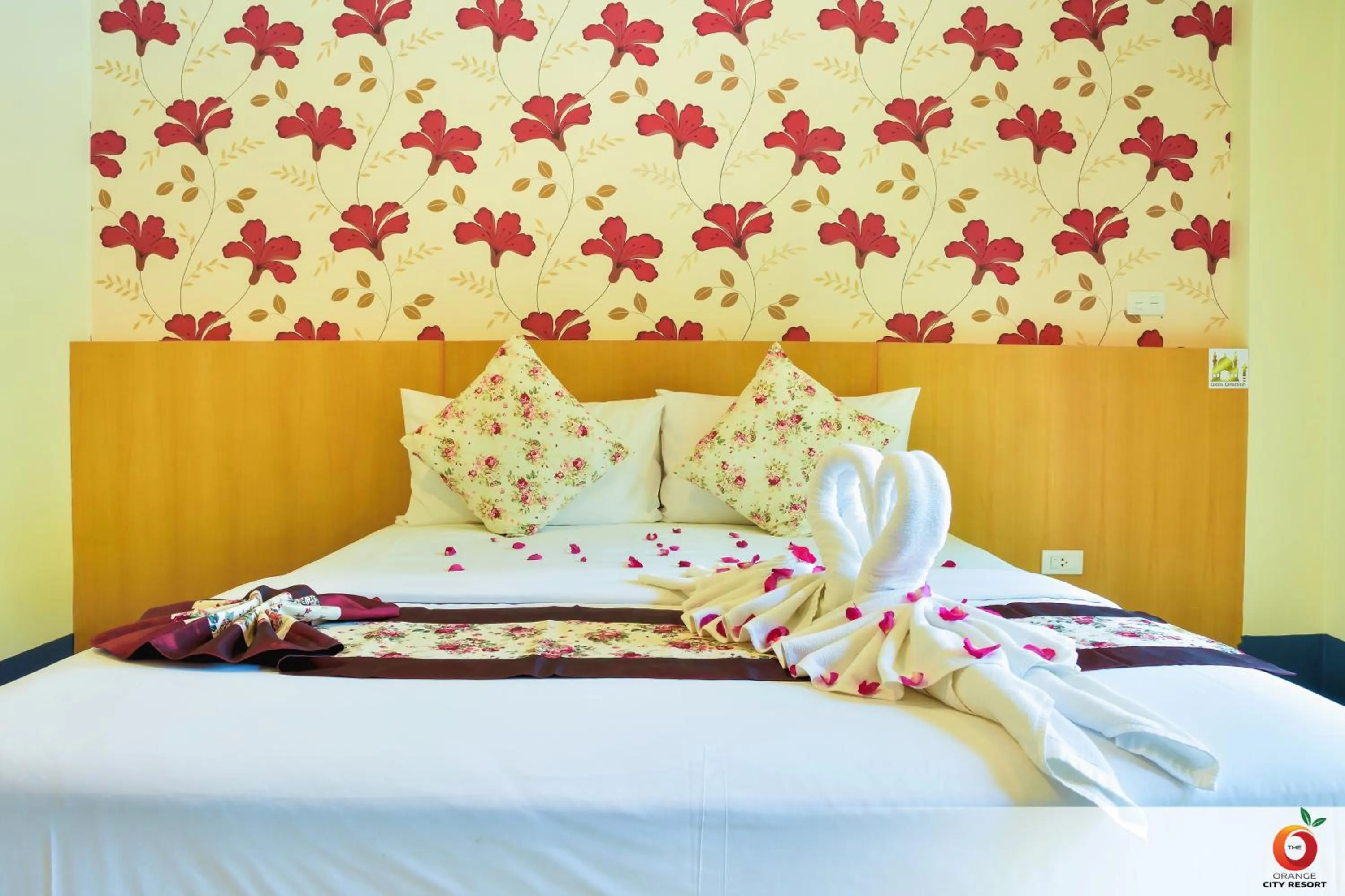 Bed in The Orange City Resort