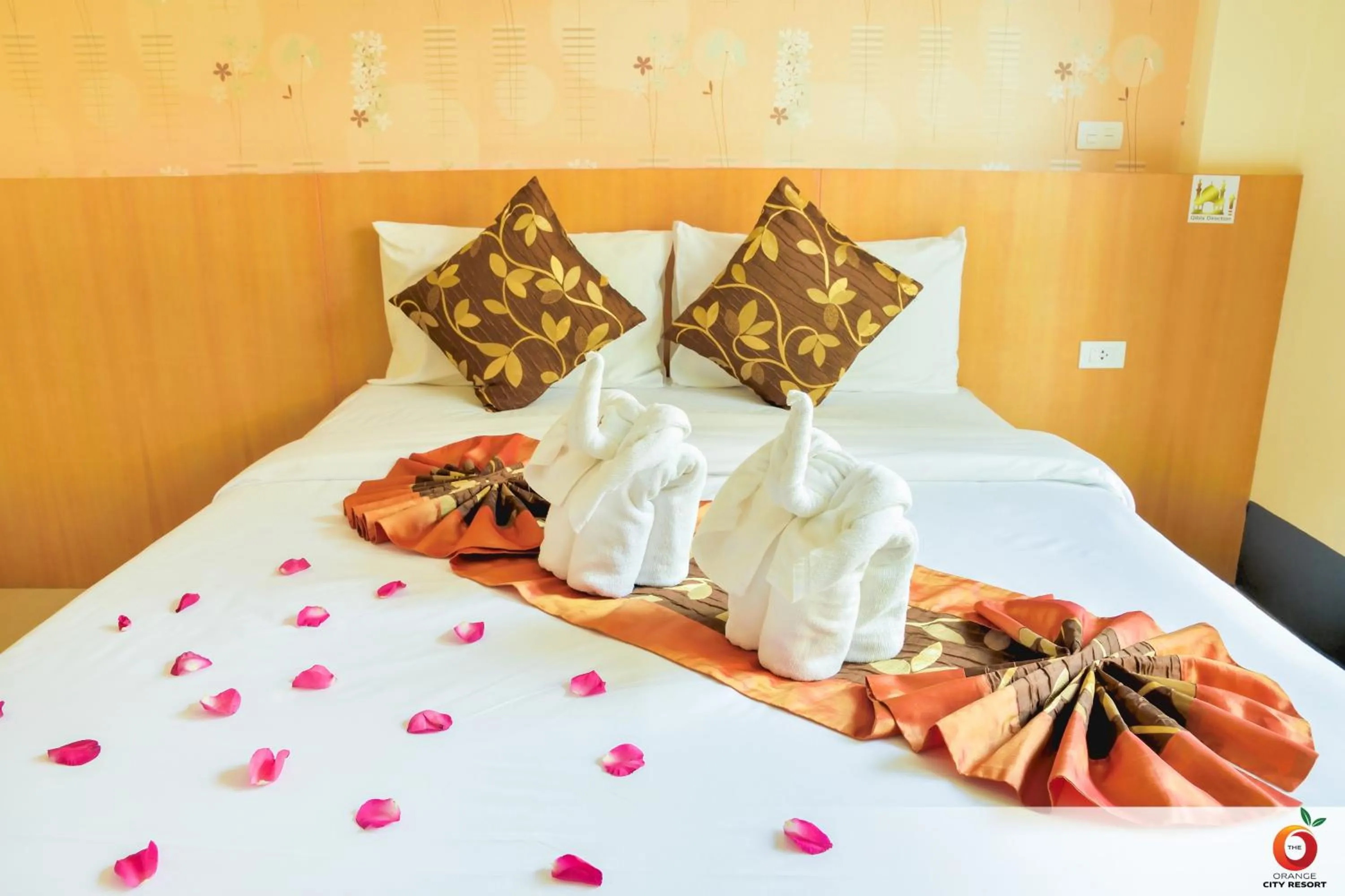 Bed in The Orange City Resort