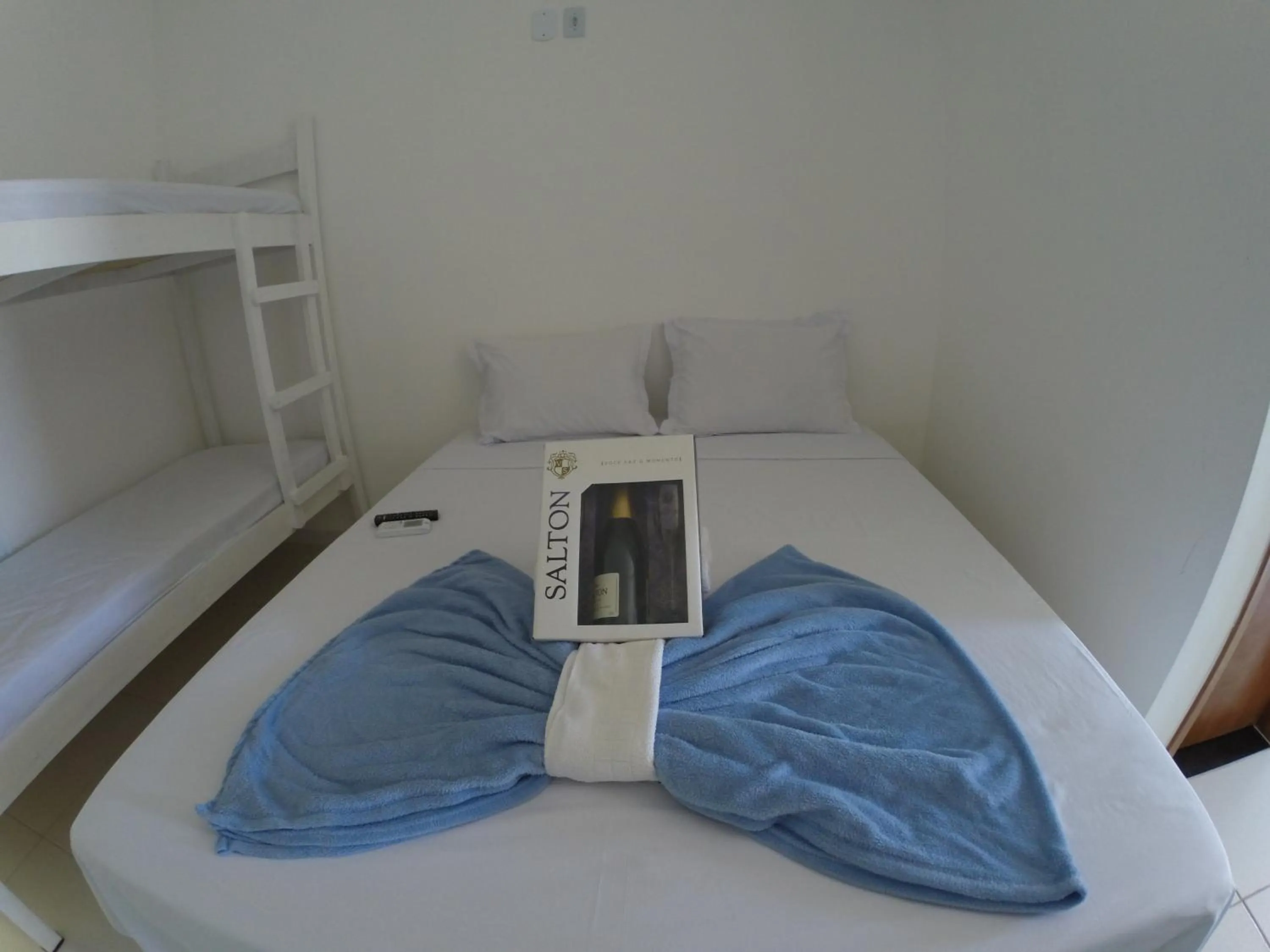 Bed in Xodó do Peró Suítes