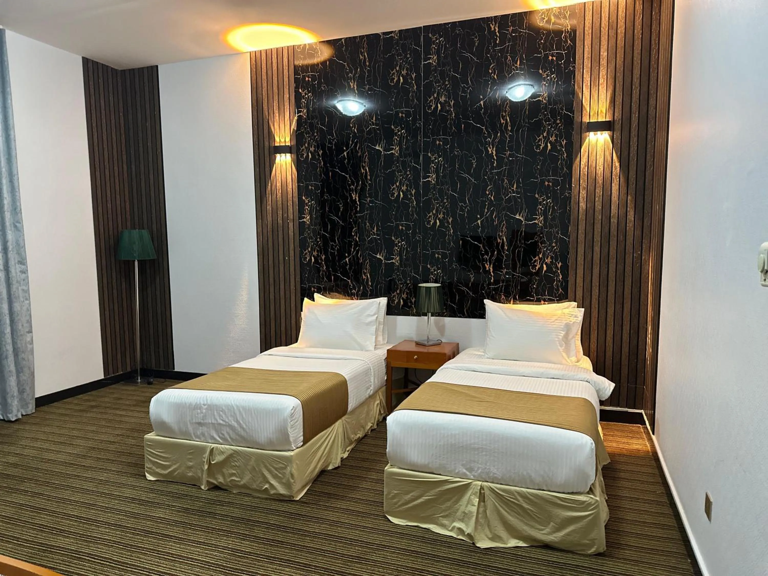 Bed in Al Massa Plus Hotel