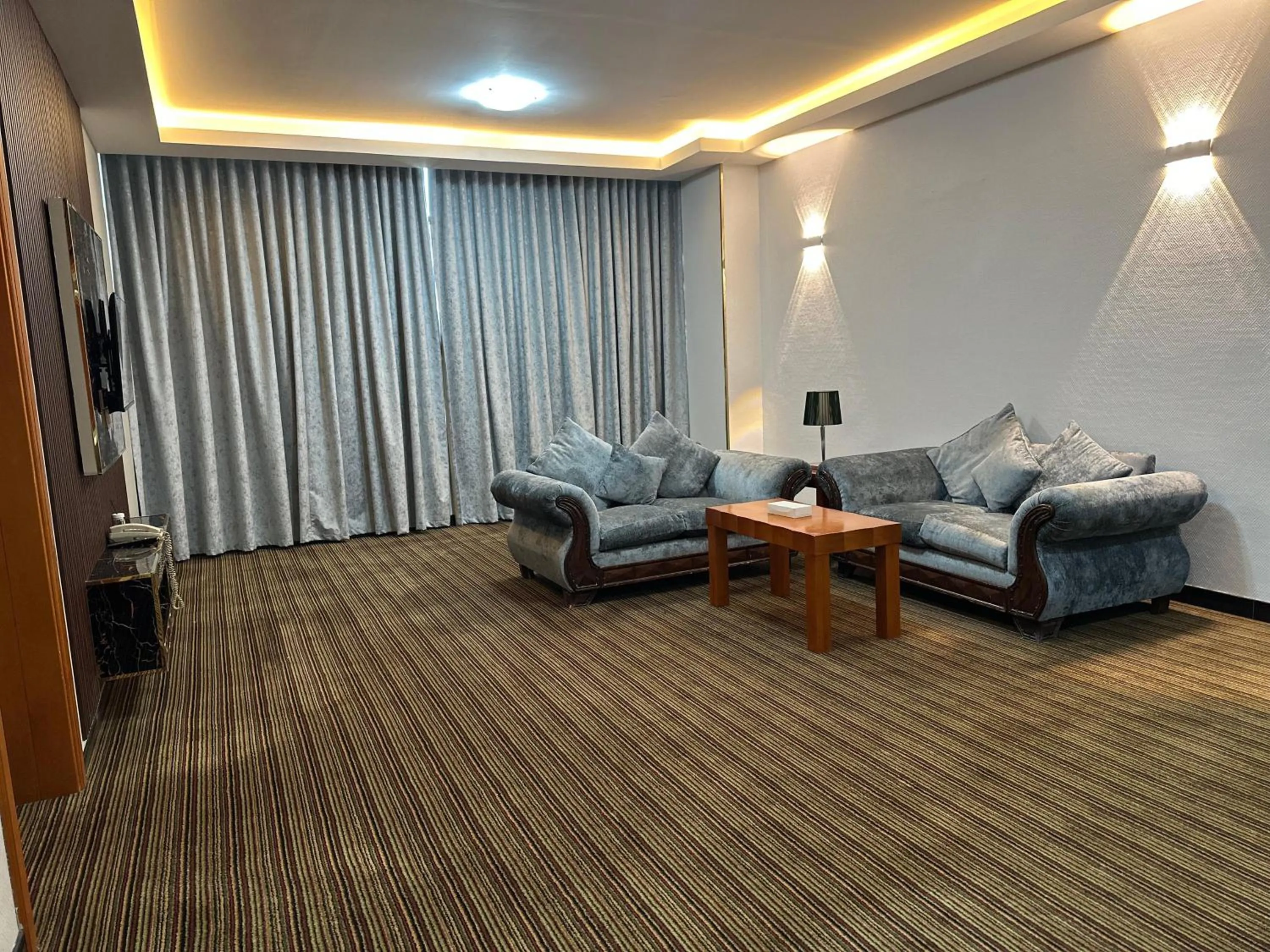 Seating area in Al Massa Plus Hotel