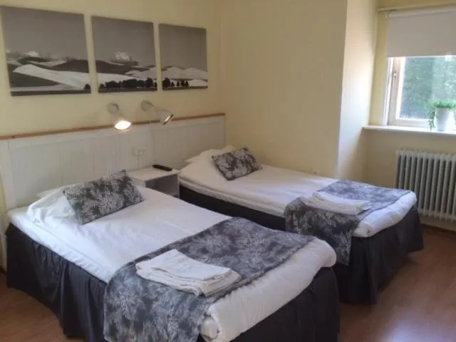 Bed in Hotell Paradis