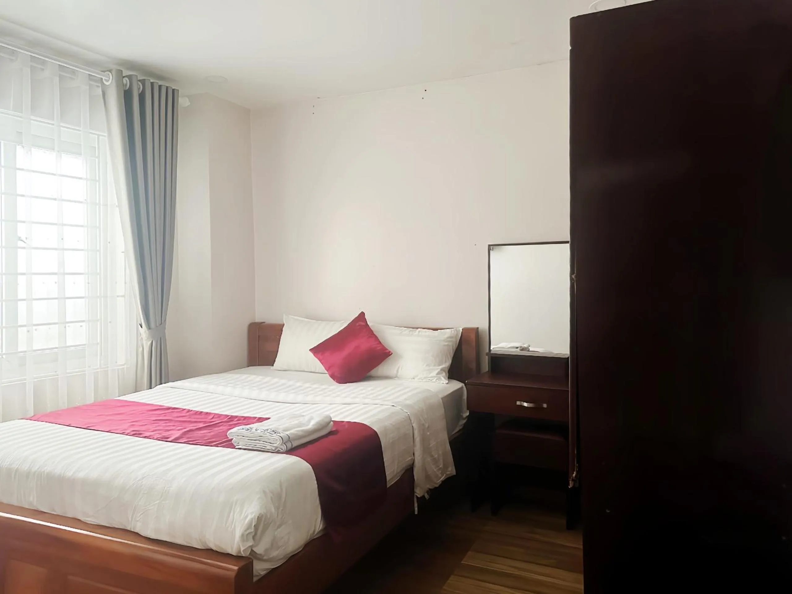 Bed in White Horse Dalat Hotel