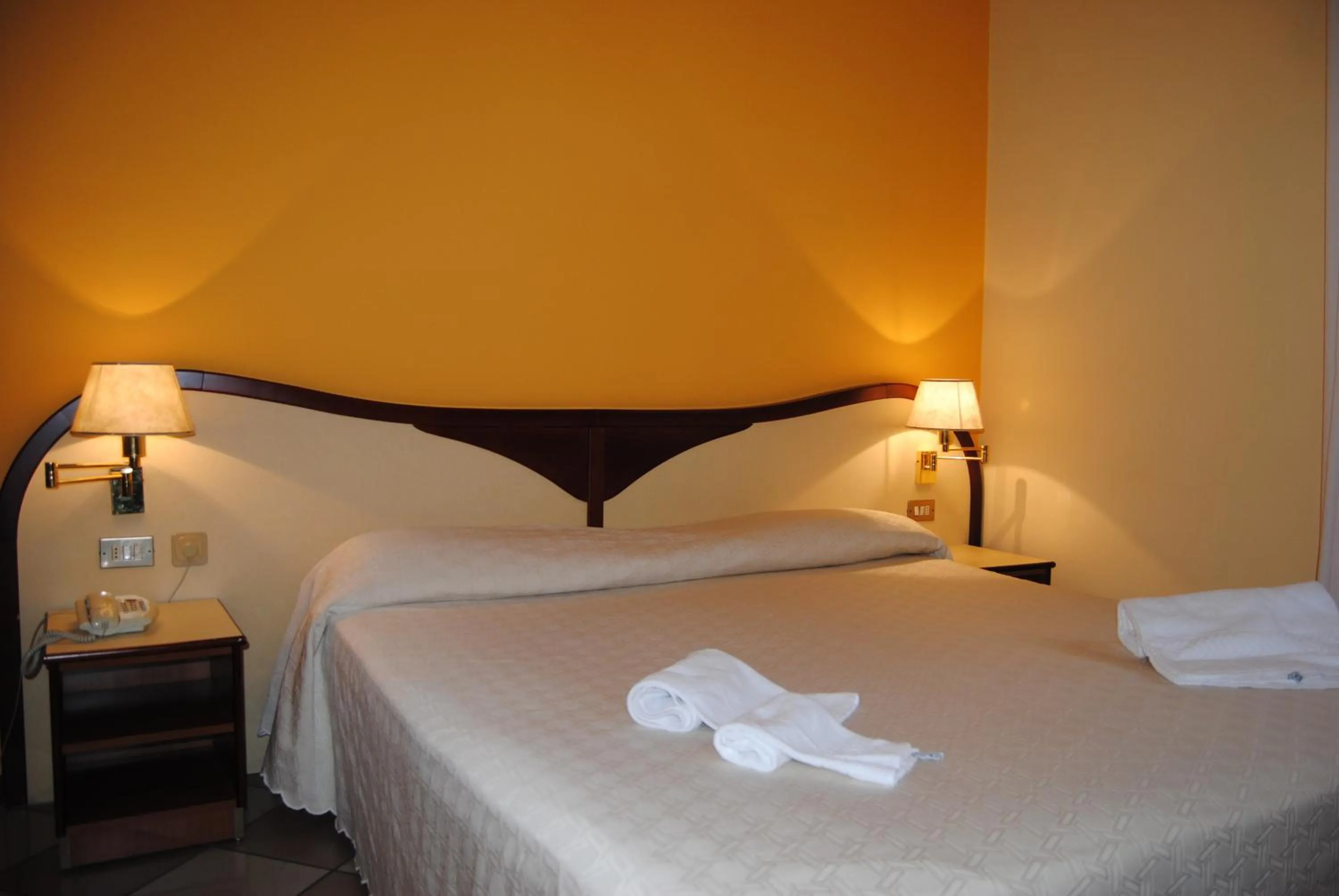 Bed in Hotel La Fenice