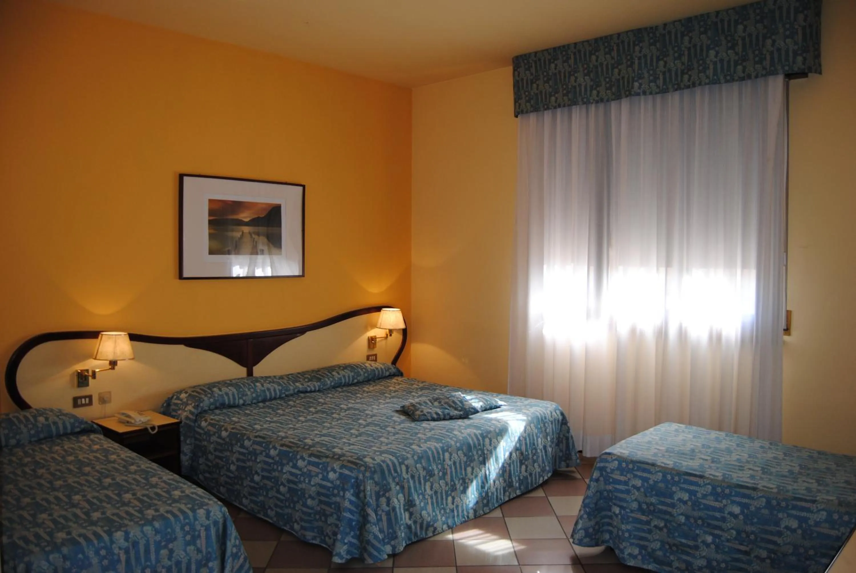 Bed in Hotel La Fenice