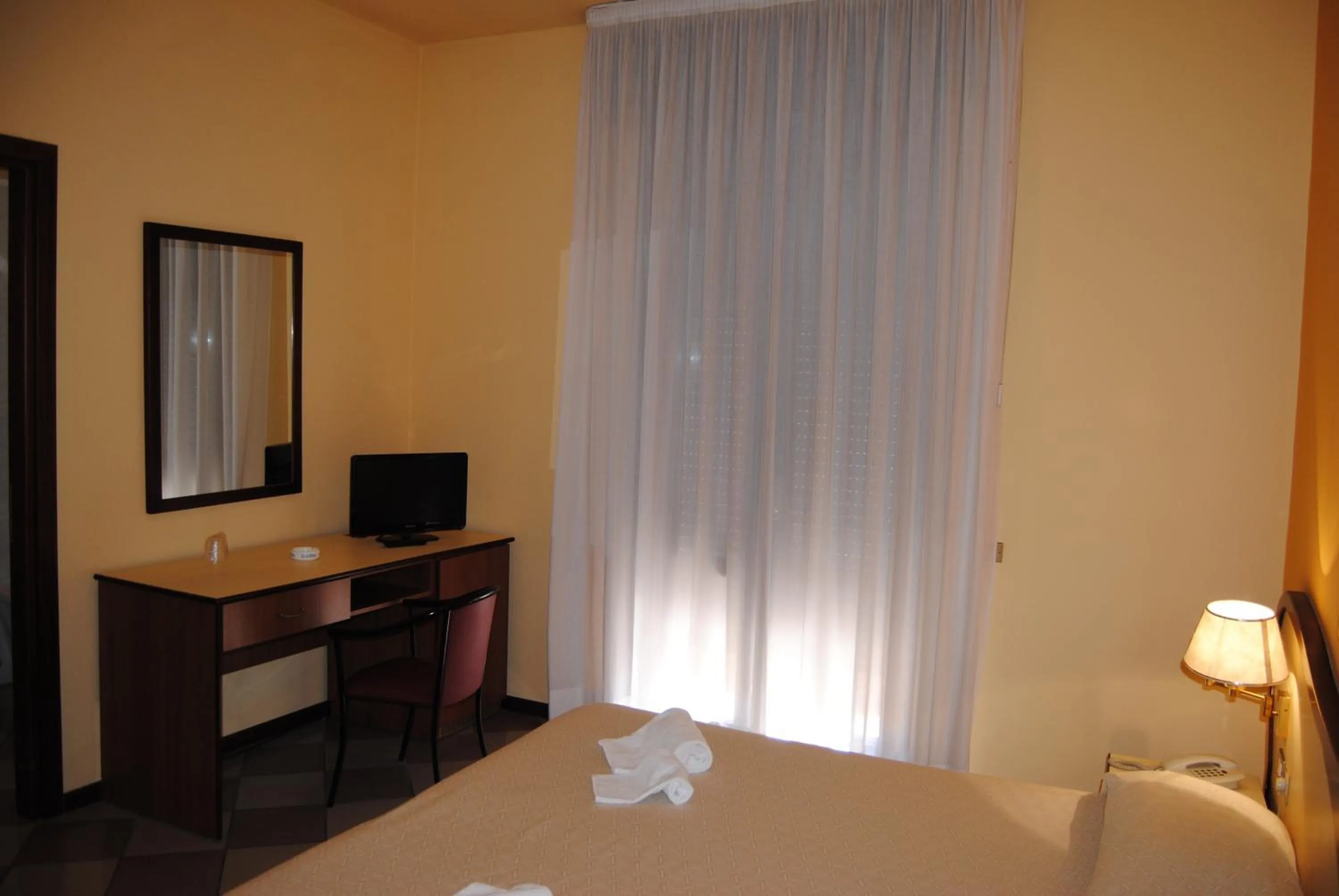 Bed in Hotel La Fenice