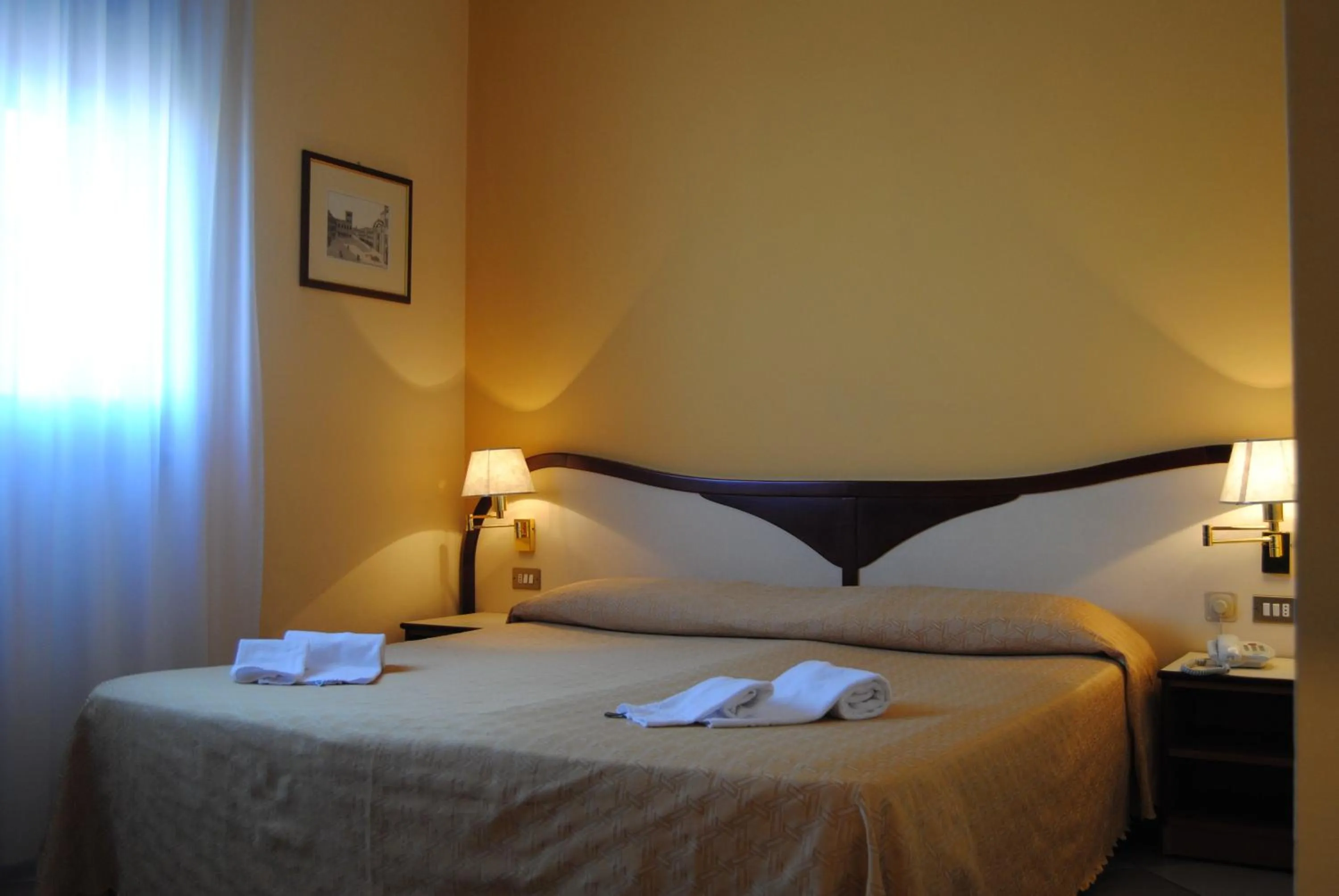 Bed in Hotel La Fenice