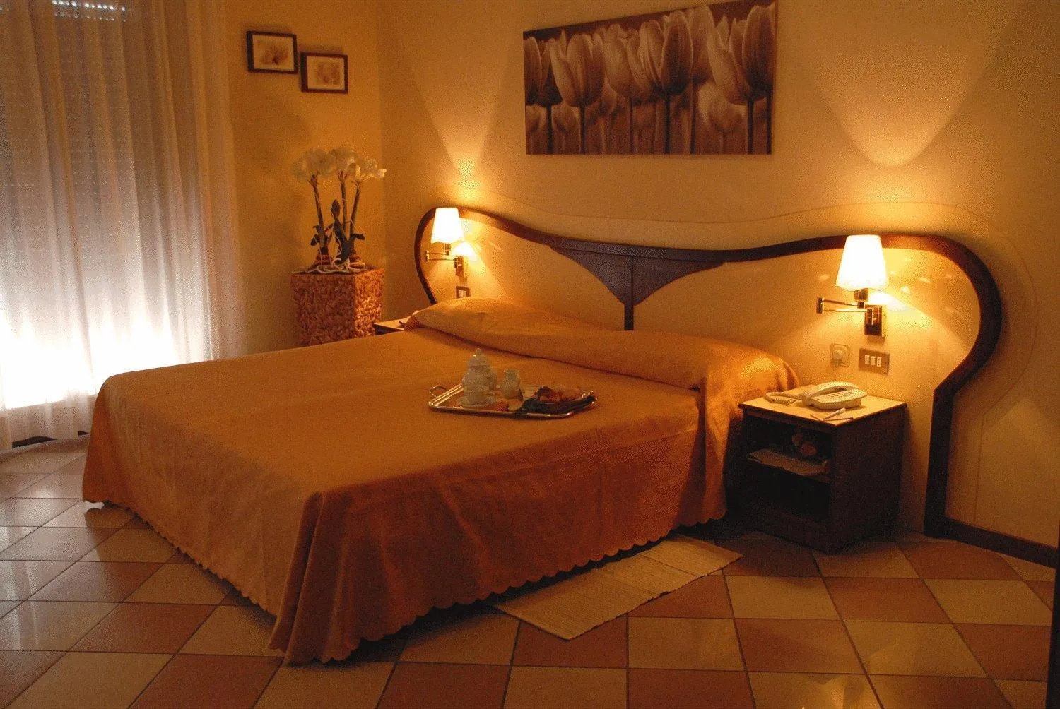 Bed in Hotel La Fenice