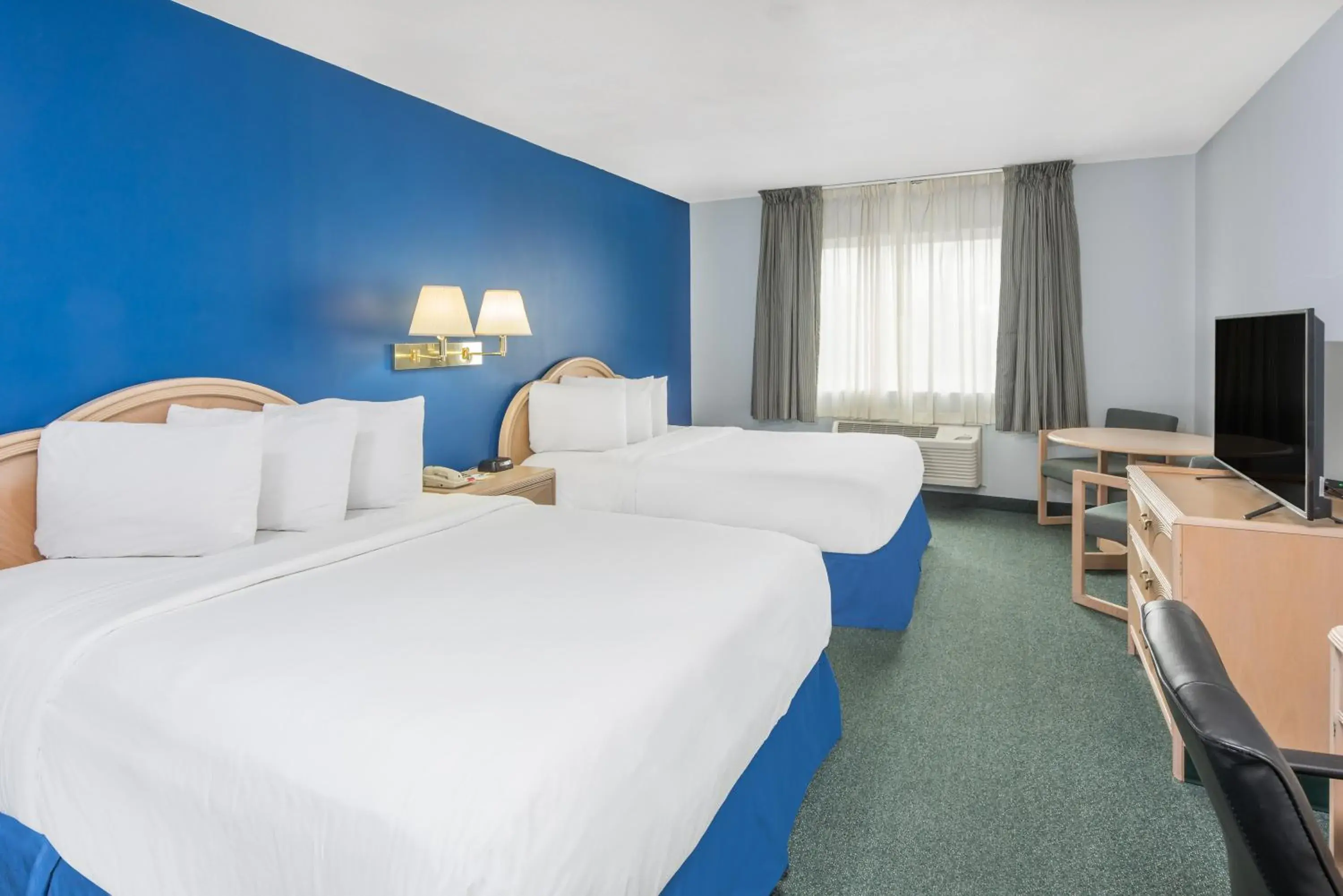 Bedroom, Bed in Days Inn by Wyndham Osage Beach Lake of the Ozarks Bedroom, Bed in Days Inn by Wyndham Osage Beach Lake of the Ozarks