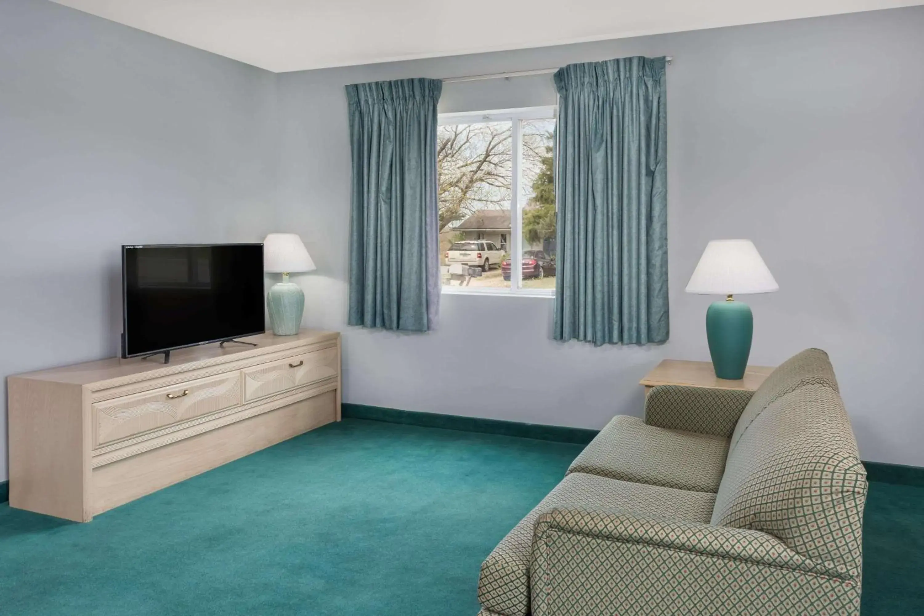 Living room in Days Inn by Wyndham Osage Beach Lake of the Ozarks Living room in Days Inn by Wyndham Osage Beach Lake of the Ozarks