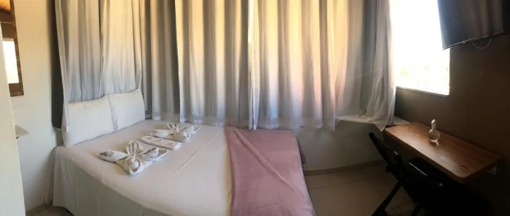 Bed in Bougainville Suítes