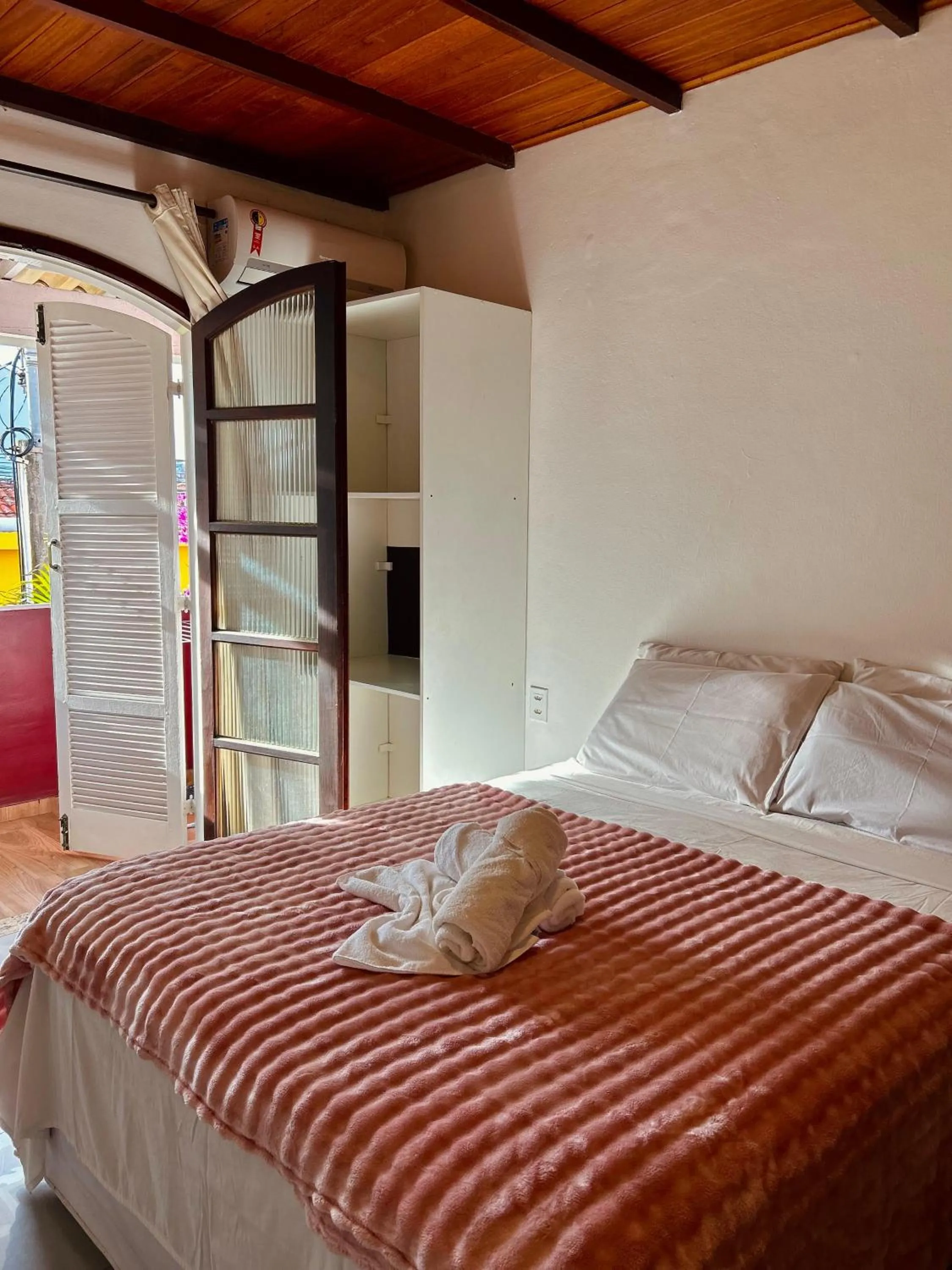 Bed in Bougainville Suítes