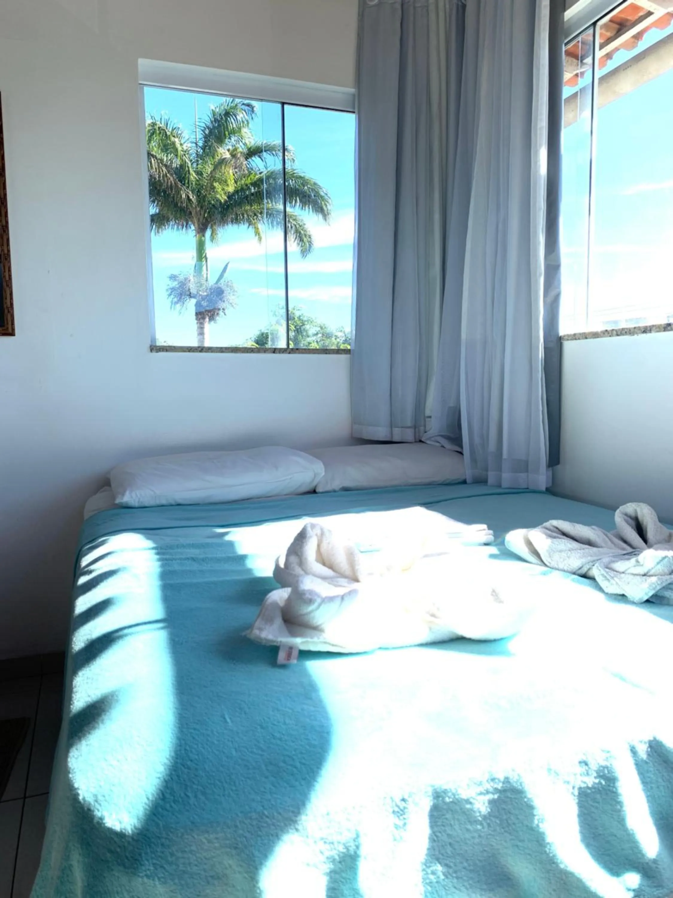 Bed in Bougainville Suítes