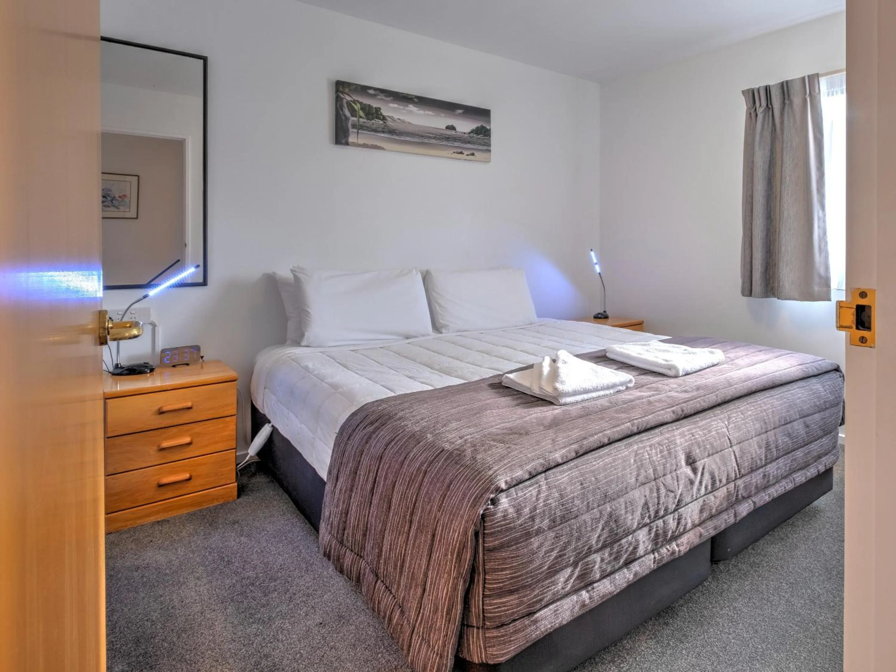 Bed in ASURE Hanmer Inn Motel Hanmer Springs