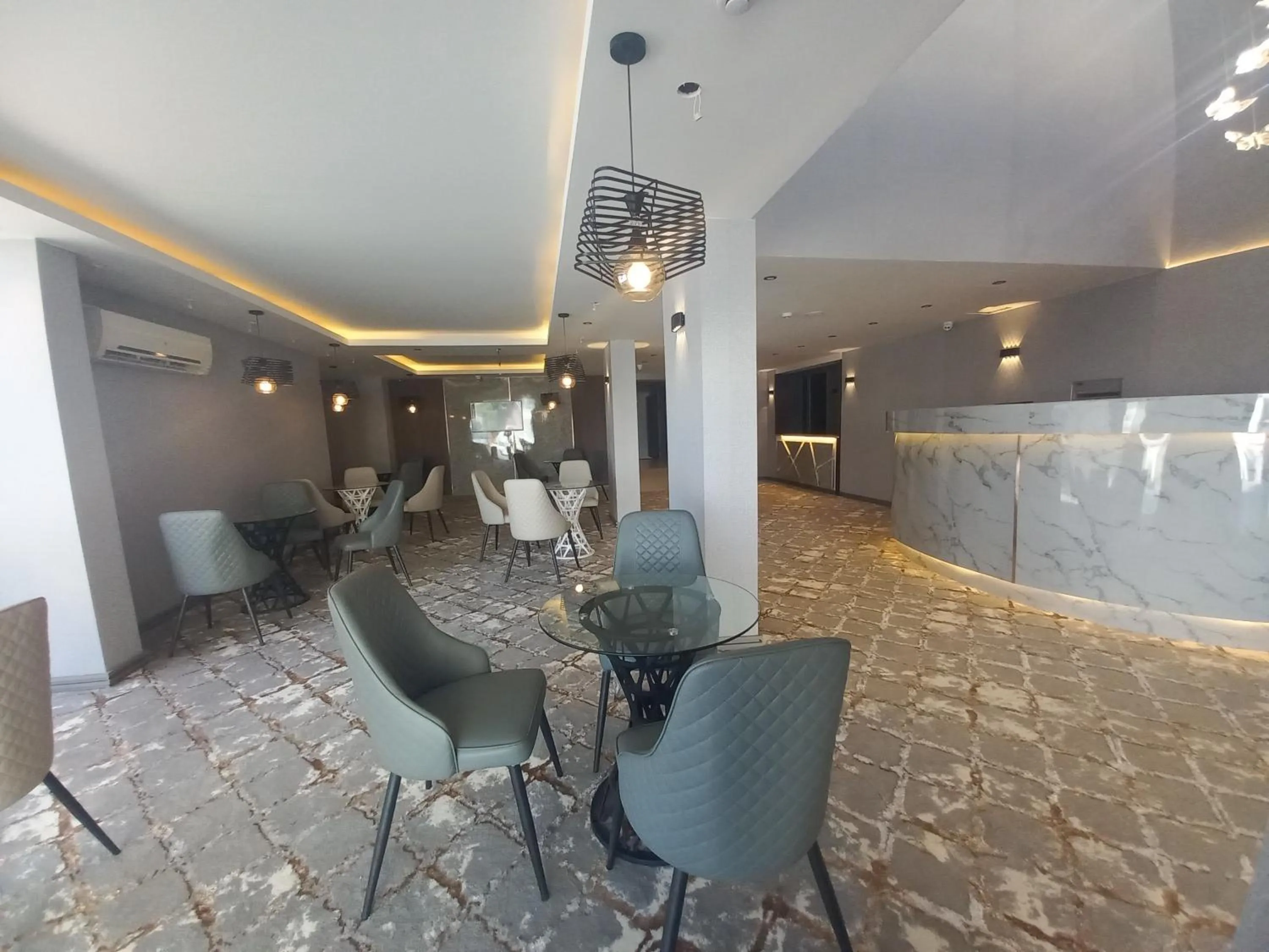 Lobby or reception in Sur Hotel