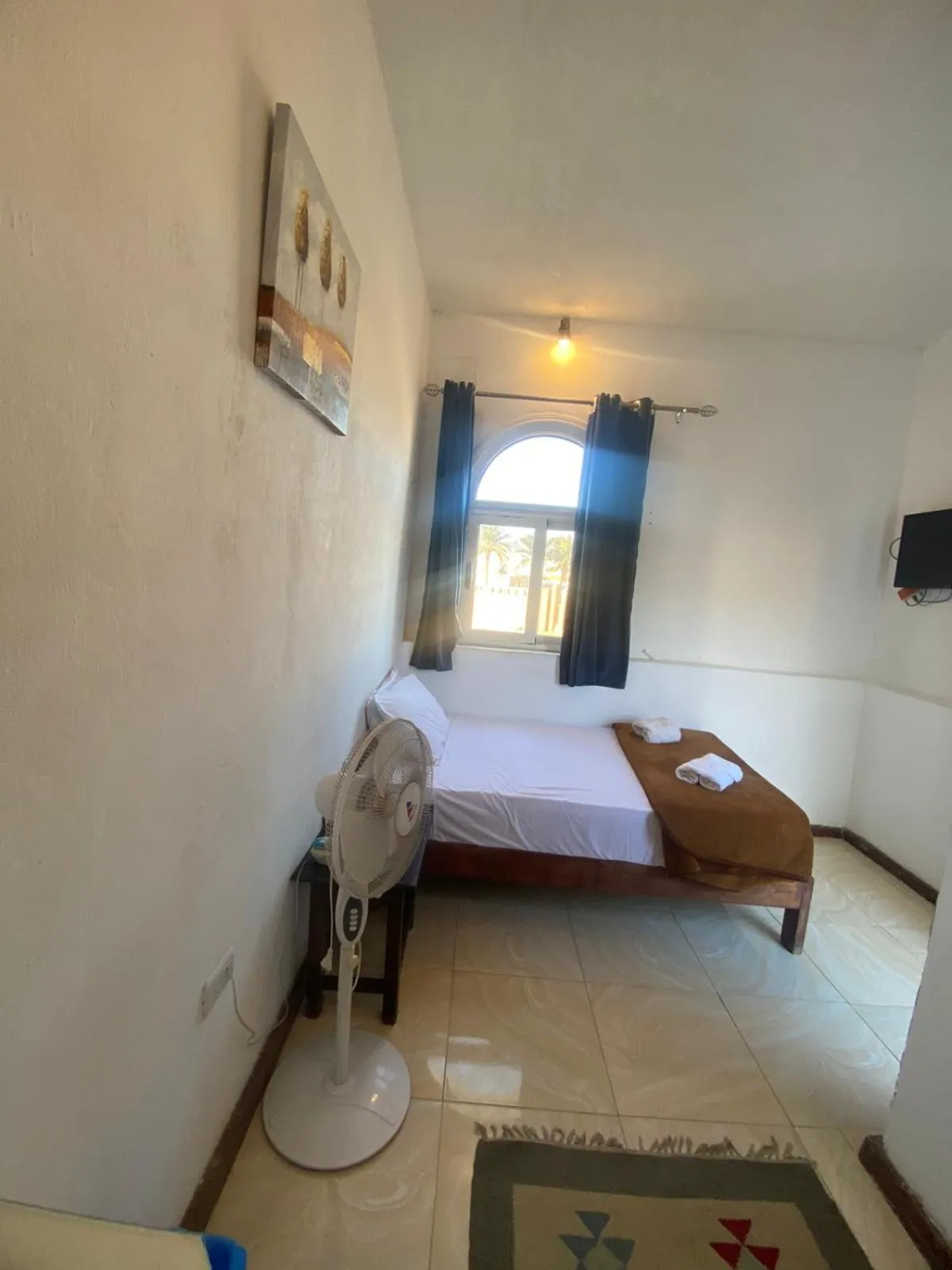 Bed in Neptune Hotel