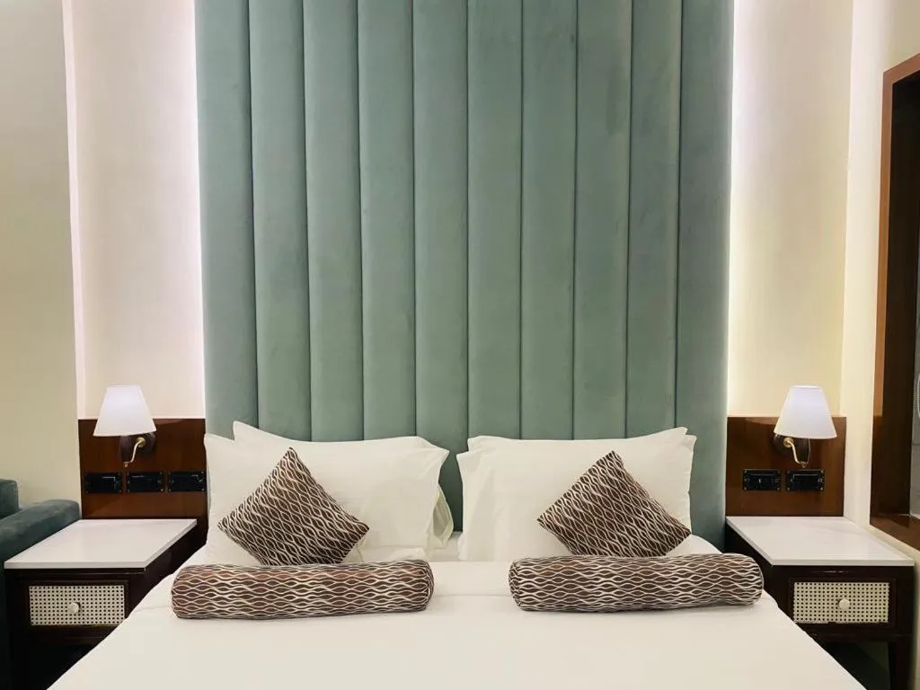 Bed in Evershine Resort & Spa