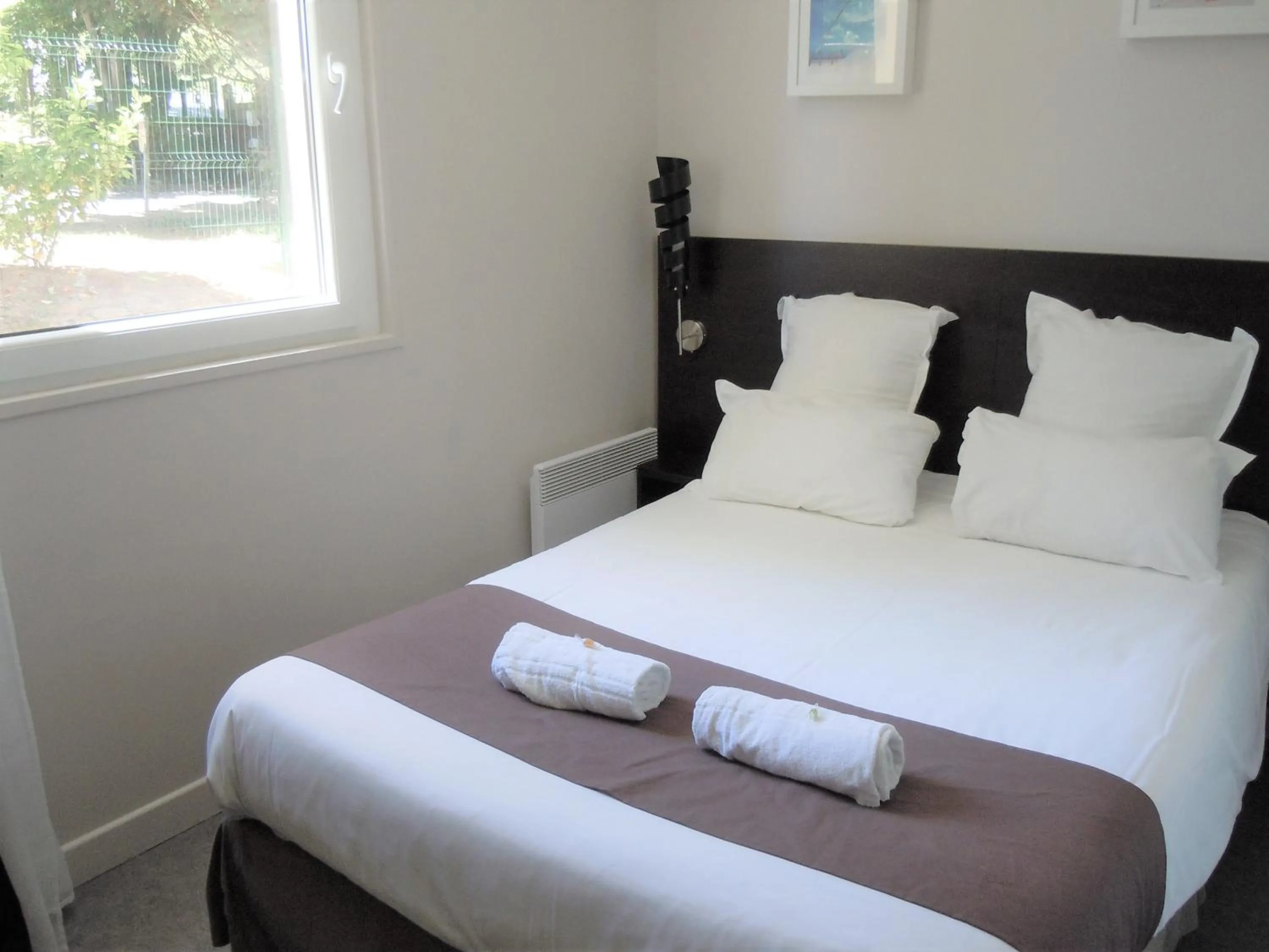 Bed in Sweet Home Appart'Hôtel Deauville Sud