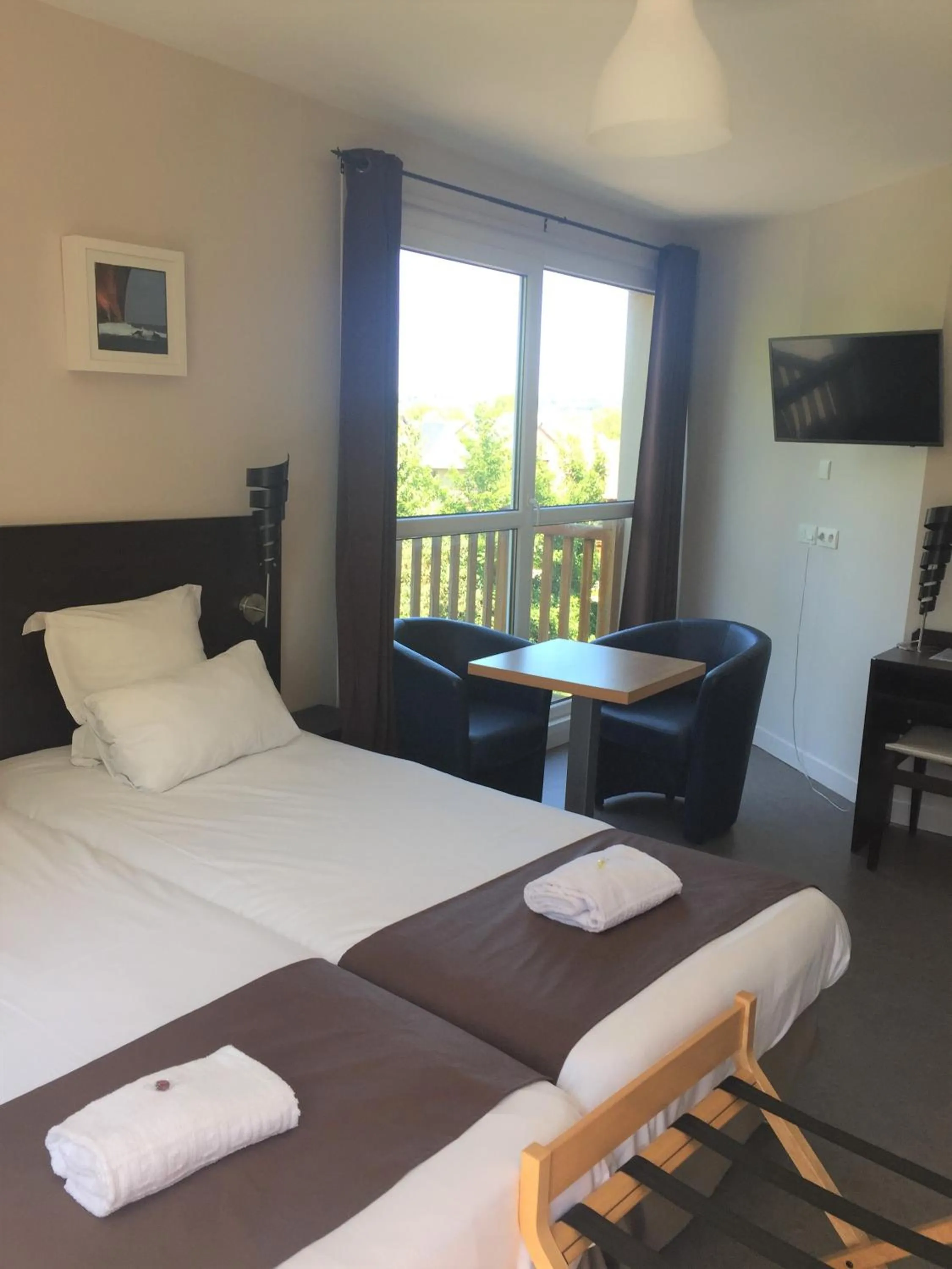 Bed in Sweet Home Appart'Hôtel Deauville Sud