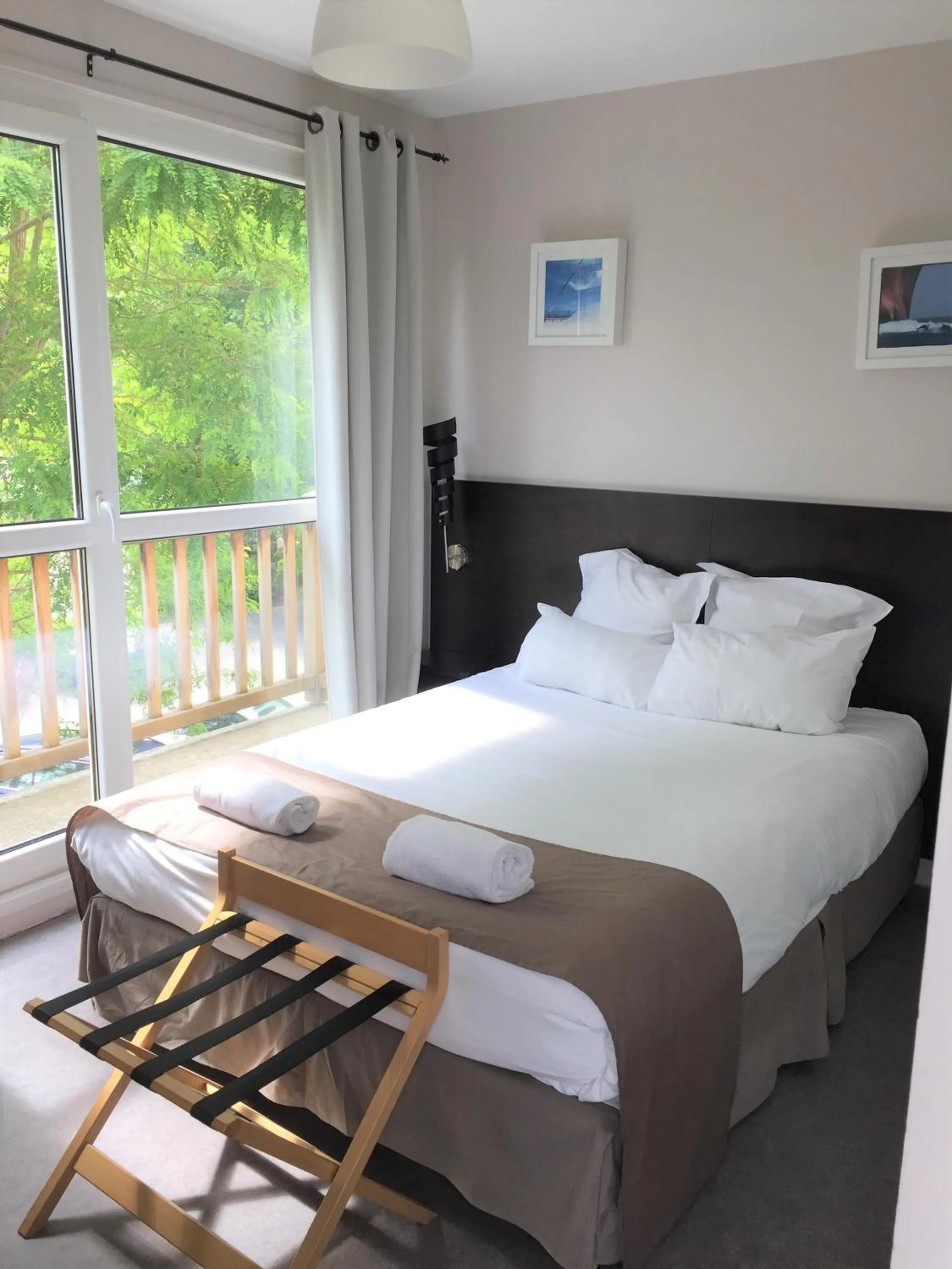 Bed in Sweet Home Appart'Hôtel Deauville Sud